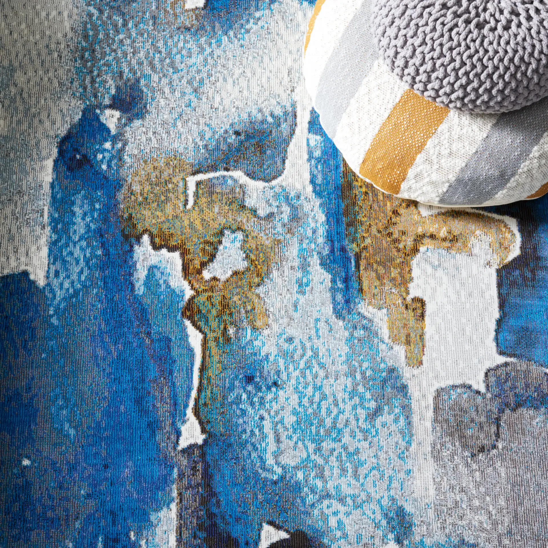 Aria Abstract Painterly Rug in Ivory / Navy in a styled room