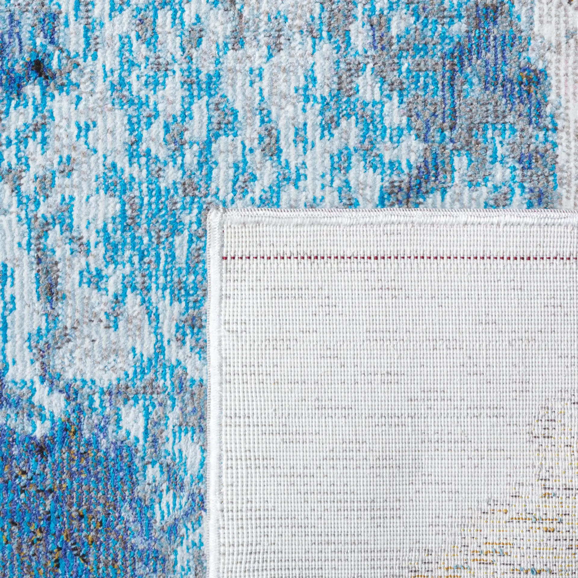 Aria Abstract Painterly Rug in Ivory / Navy in a styled room