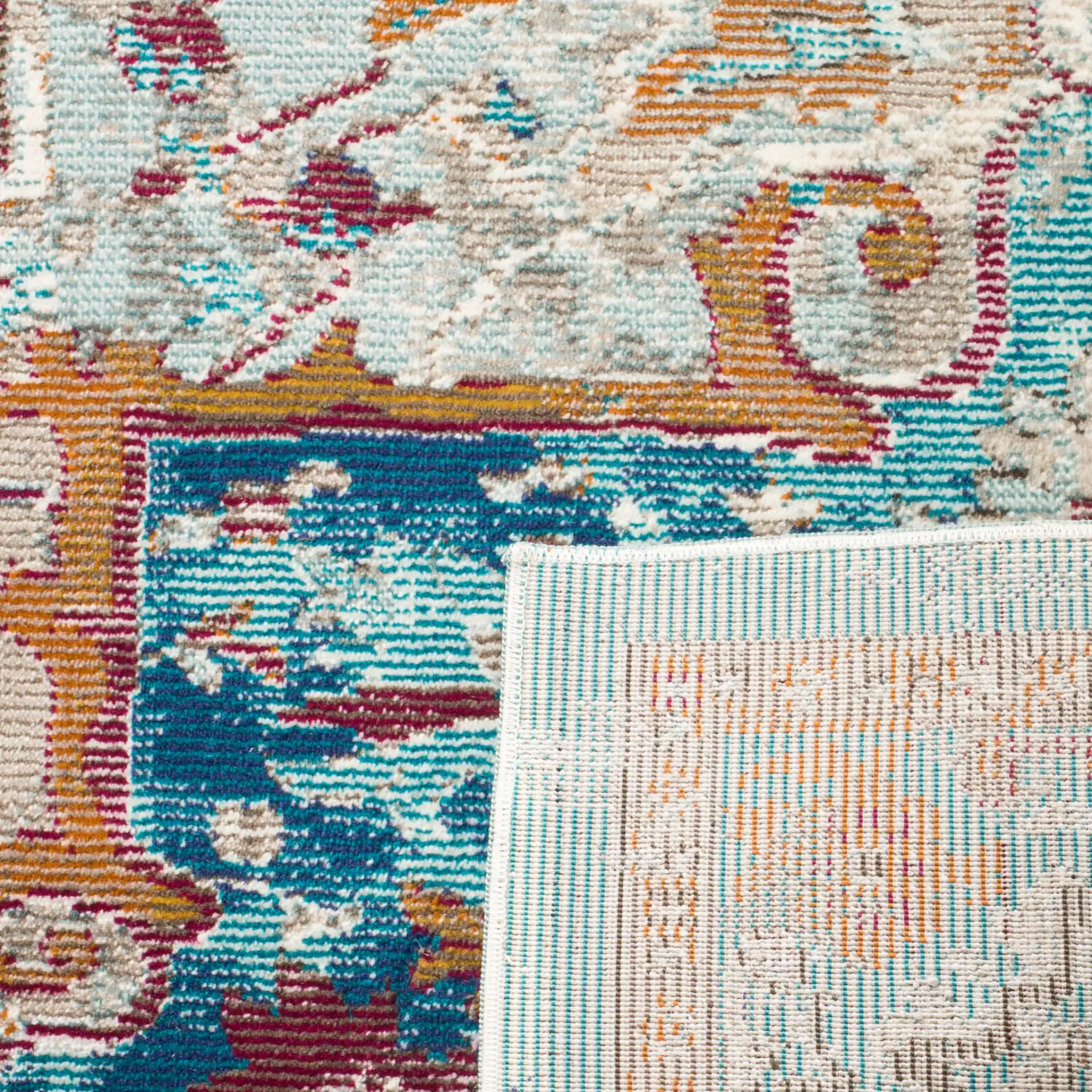 Aria Distressed Tribal Medallion Rug in Beige / Blue in a styled room