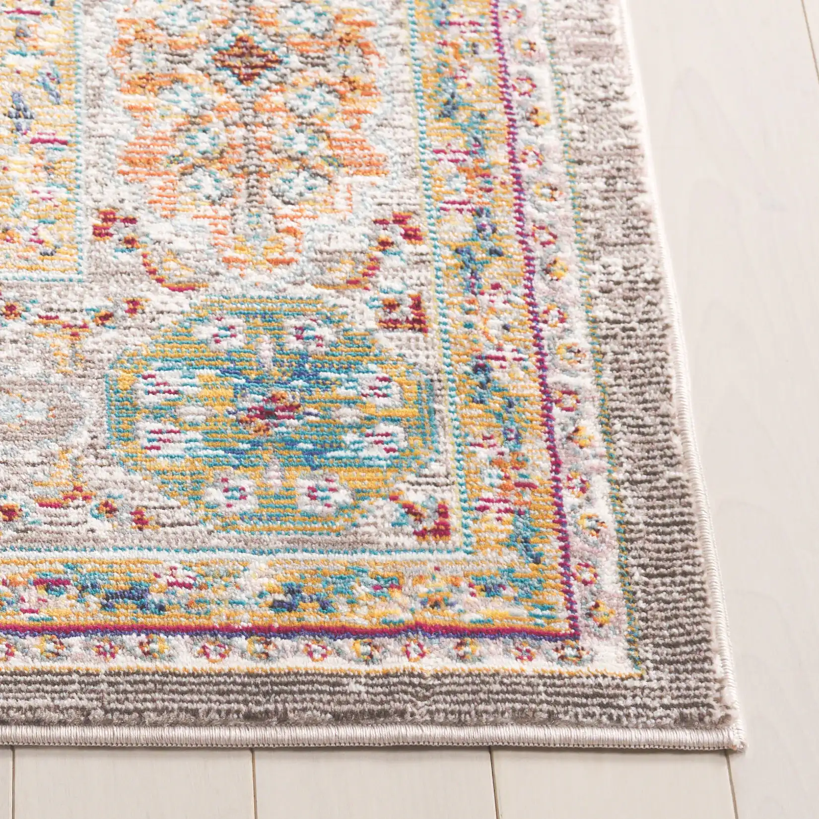 Aria Tile Patchwork Rug in Cream / Multicolor in a styled room