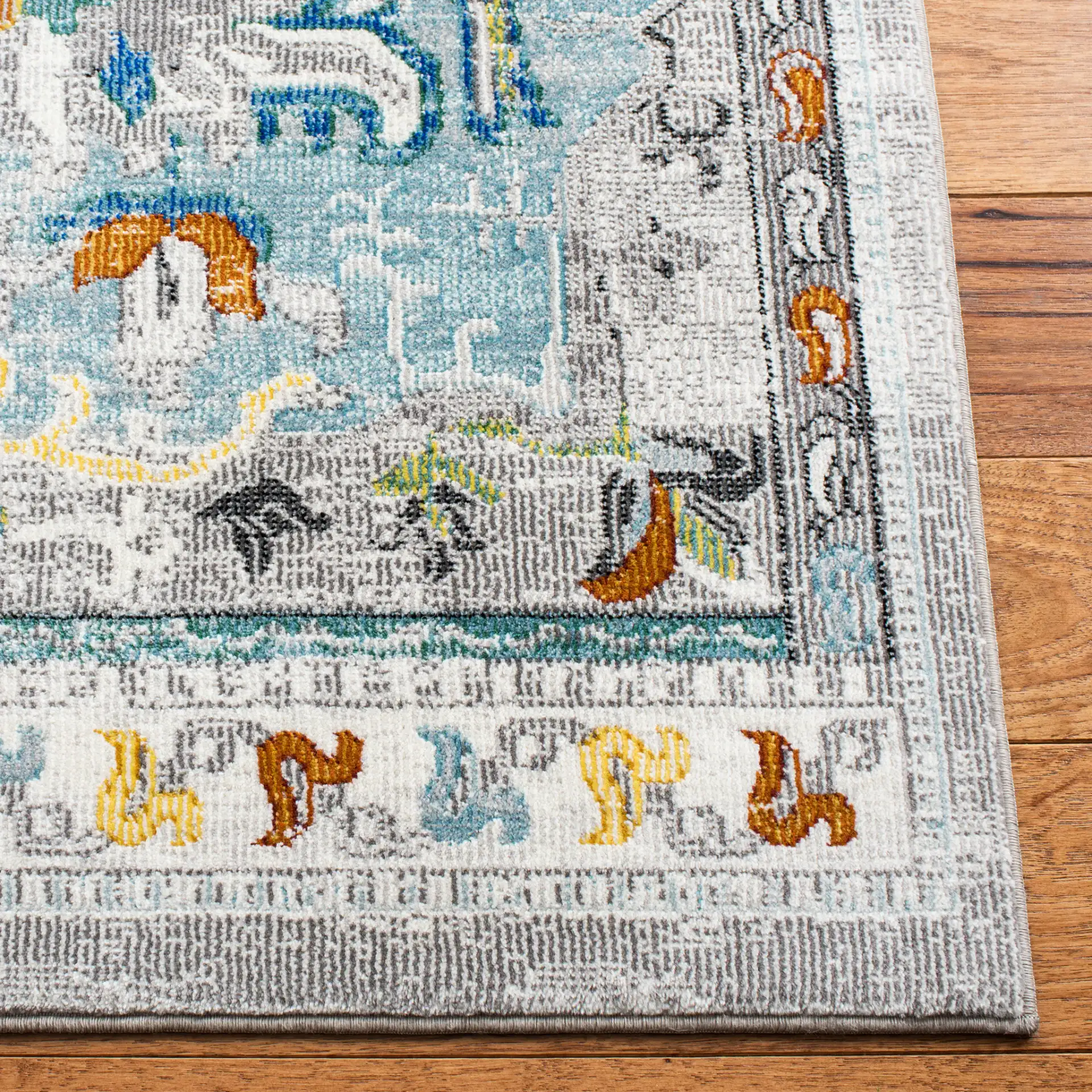 Aria Boho Medallion Rug in Gray / Blue in a styled room