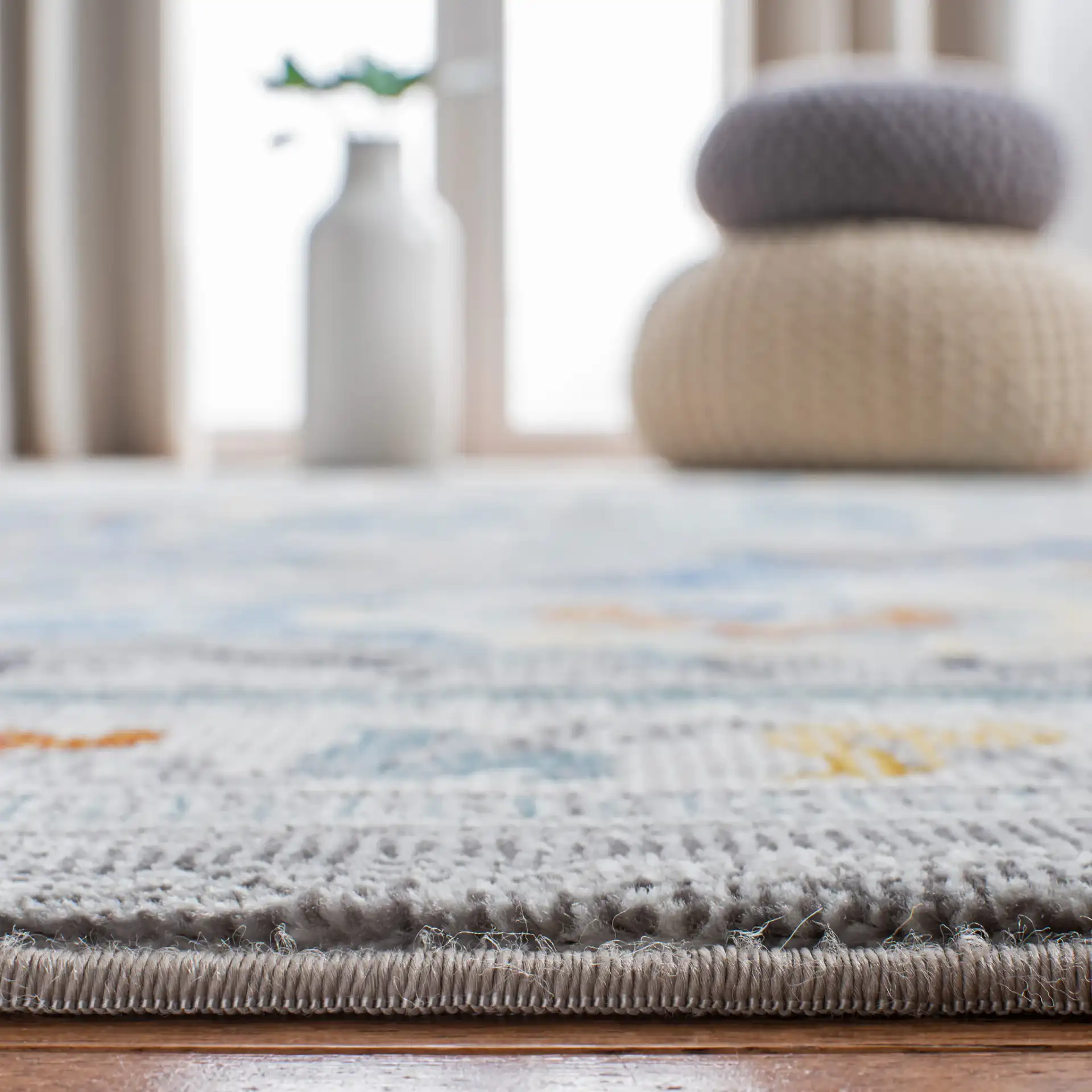 Aria Boho Medallion Rug in Gray / Blue in a styled room