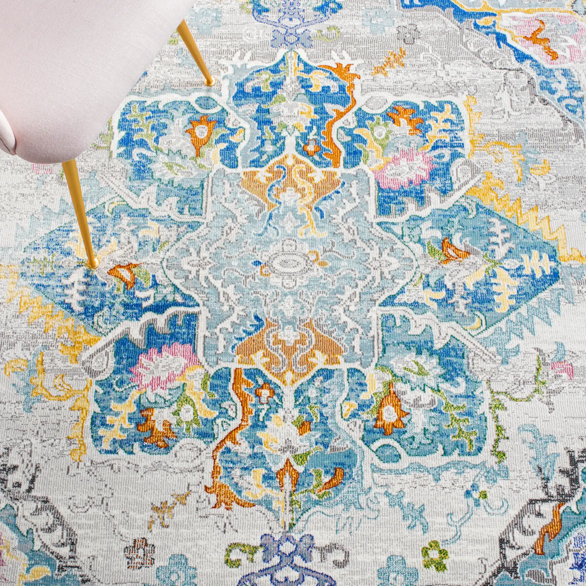 Aria Boho Medallion Rug in Gray / Blue in a styled room