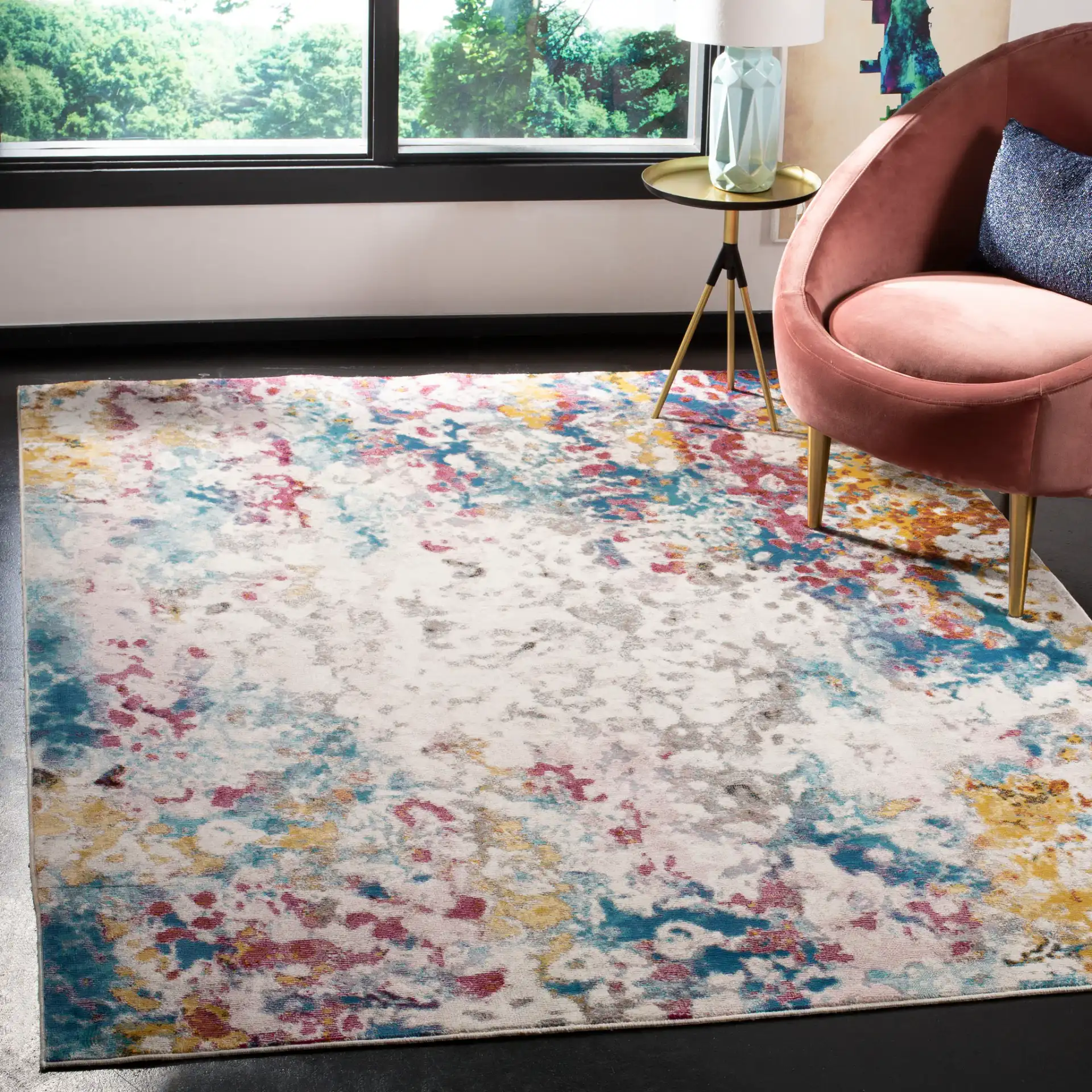 Aria Abstract Splatter Rug in Cream / Dark Teal in a styled room