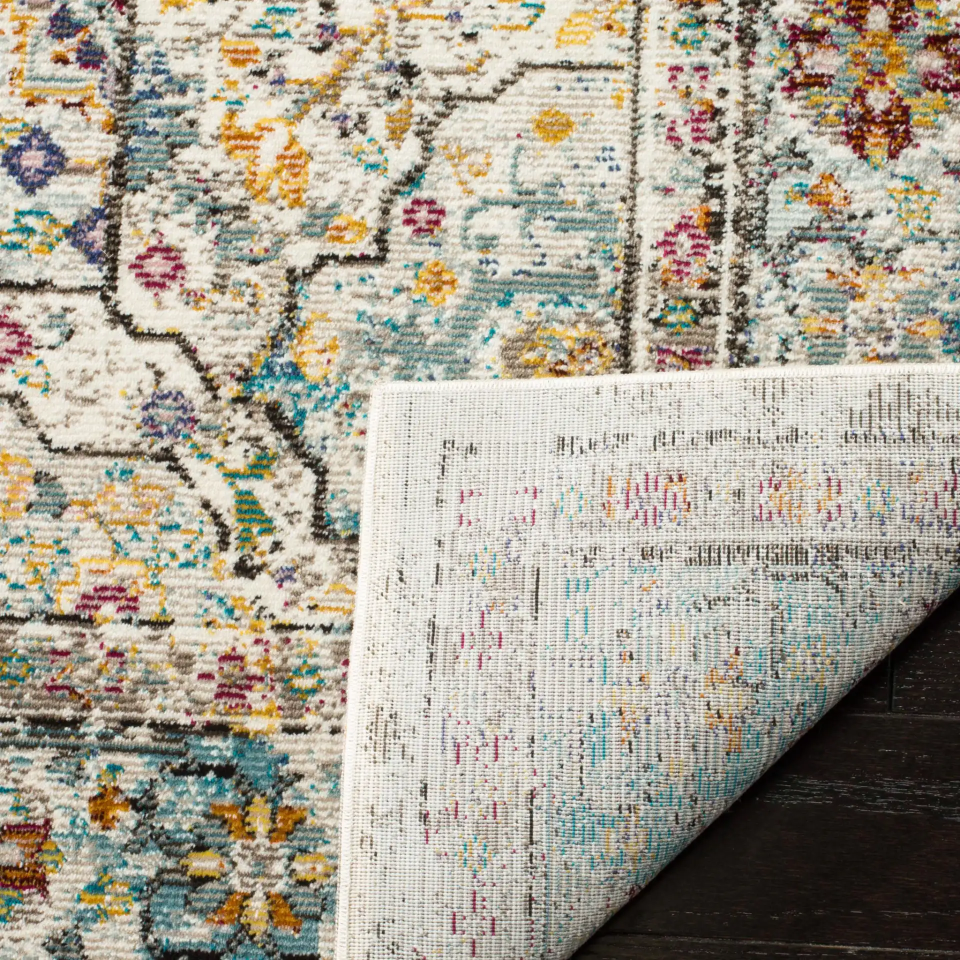 Aria Medallion Bordered Rug in Cream / Blue in a styled room