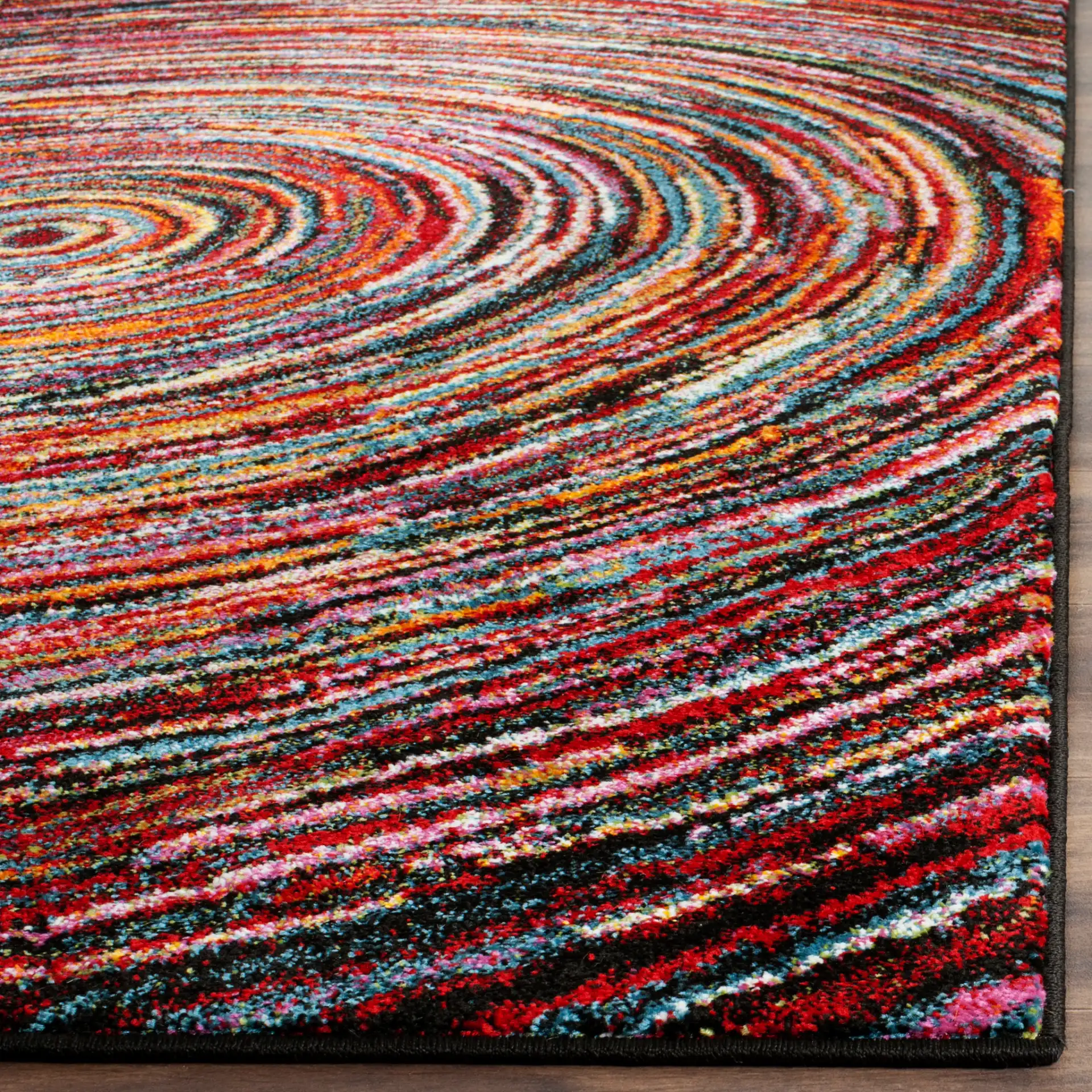 Aruba Concentric Rings Rug in Multicolor in a styled room
