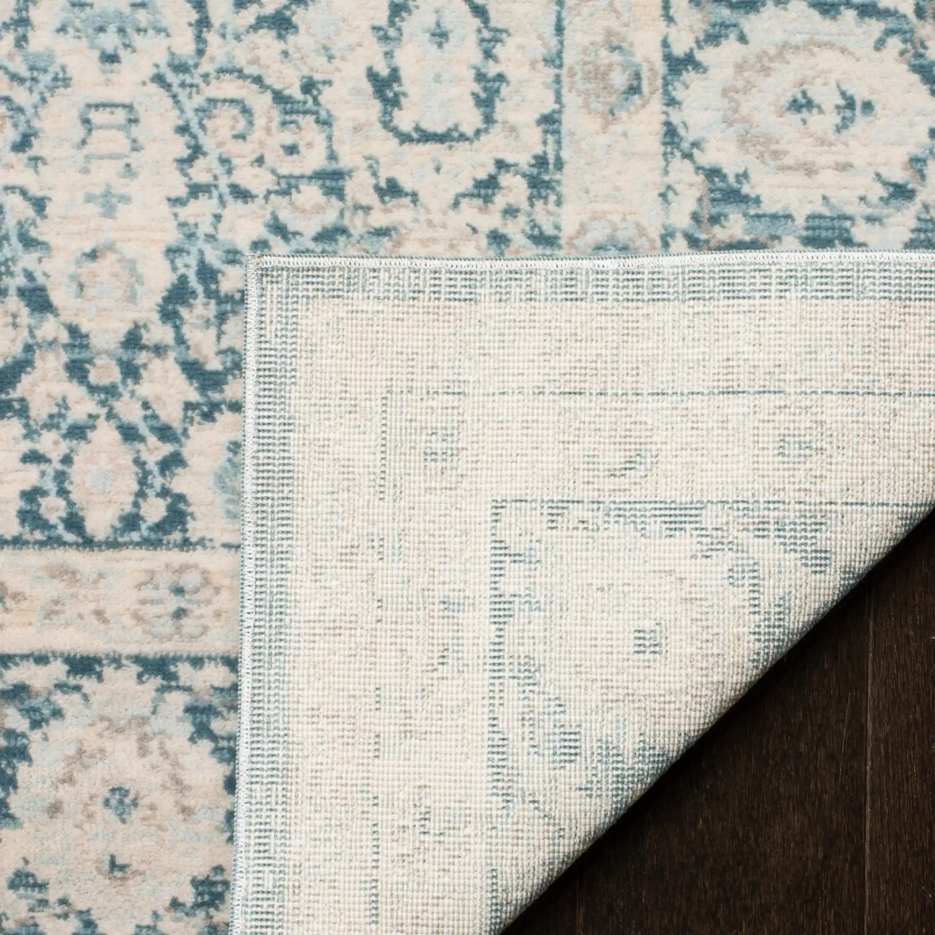 Archive Bordered Floral Rug in Blue / Gray in a styled room