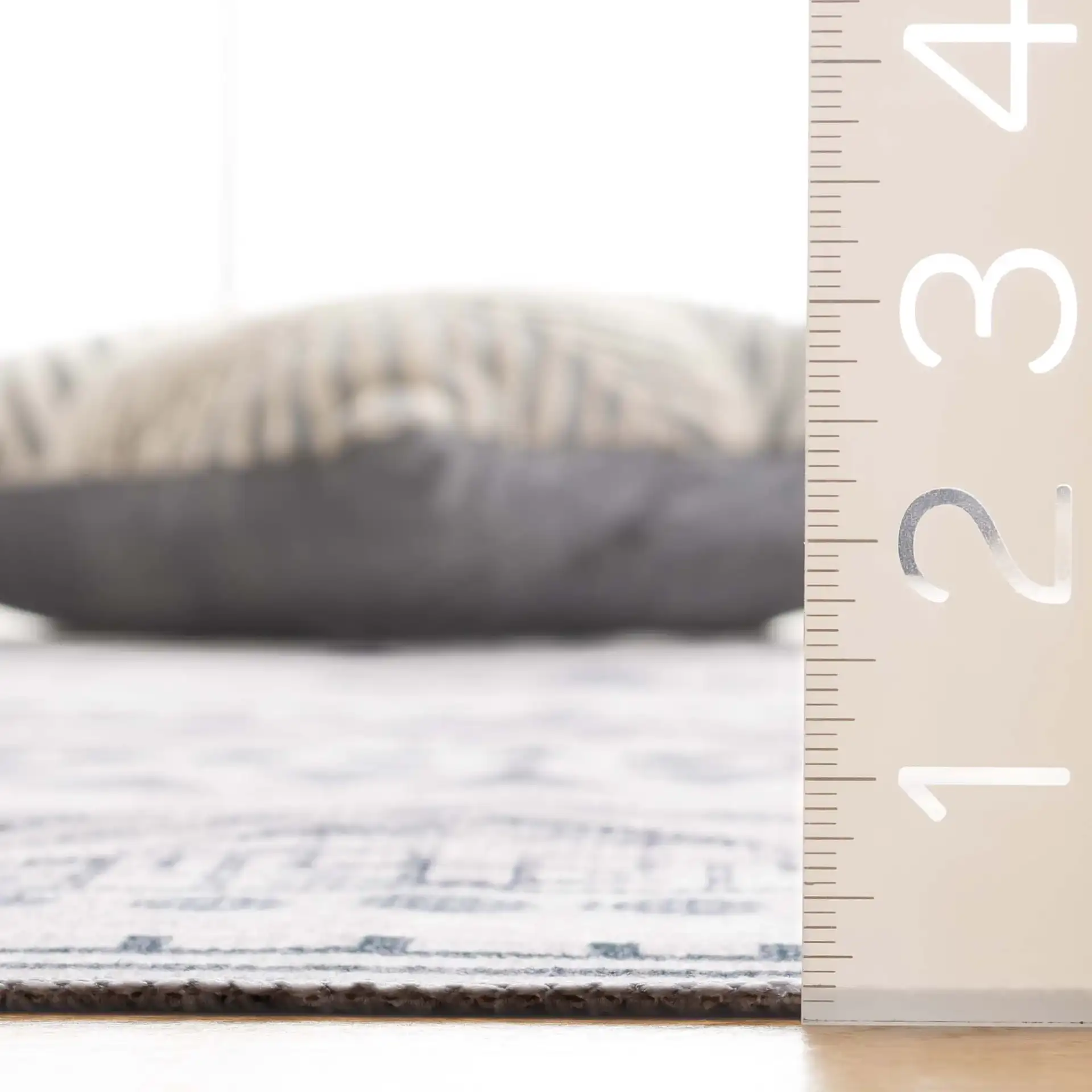 Arizona Banded Diamond Washable Rug in Beige / Charcoal in a styled room
