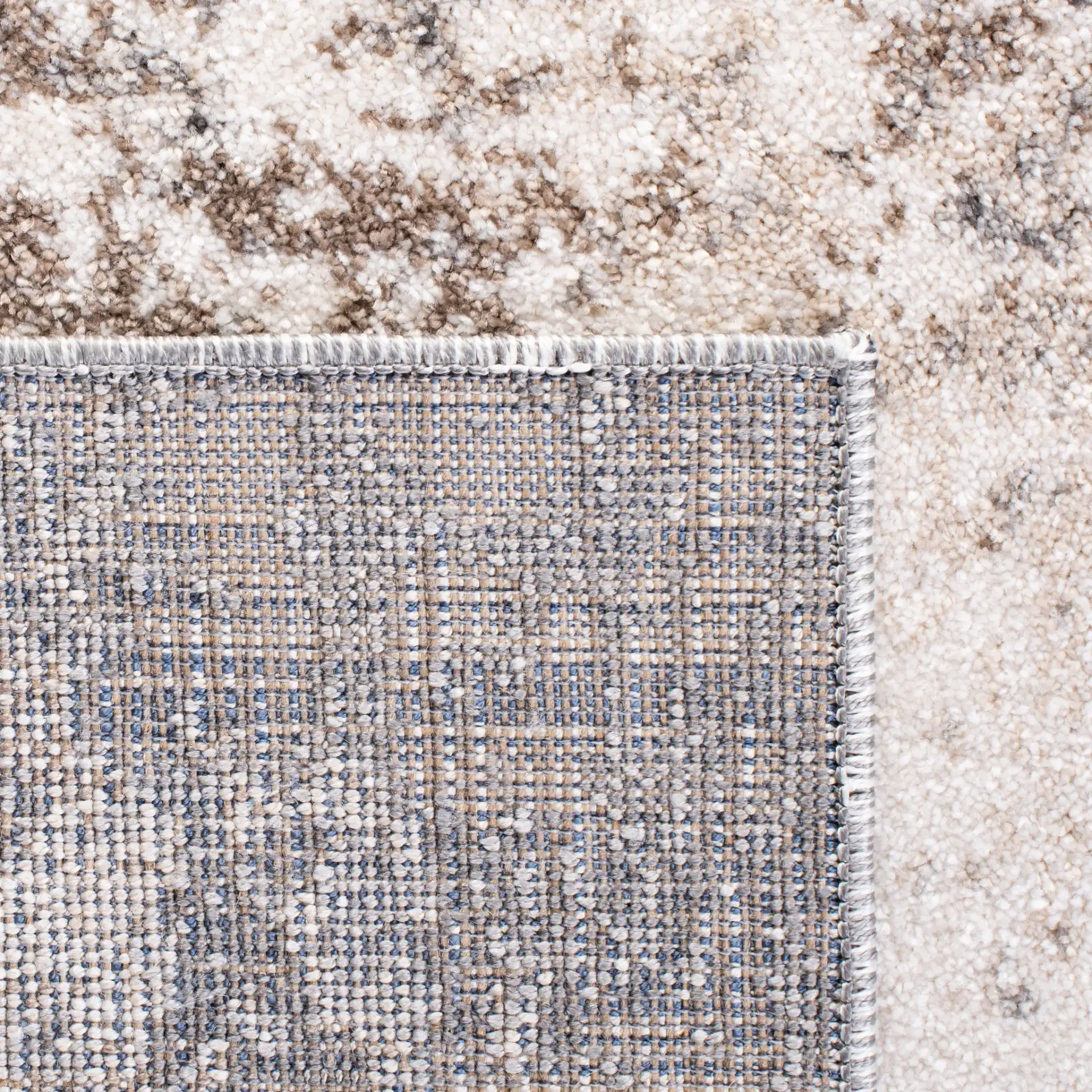 Aston Bordered Abstract Rug in Gray / Ivory in a styled room