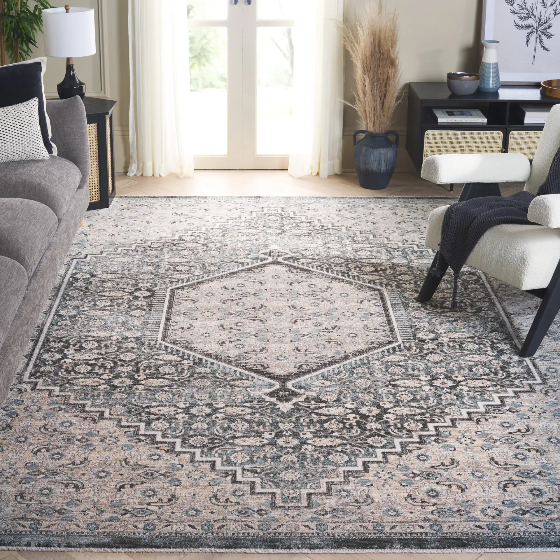Artifact Hexagonal Medallion Rug in Gray / Black in a styled room