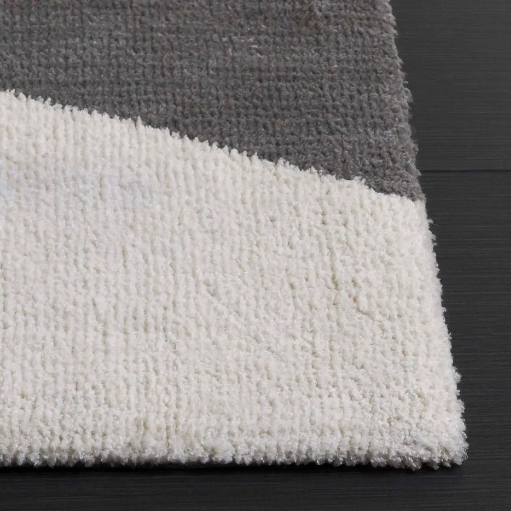 Audrey Abstract Block Rug in Gray / Ivory in a styled room