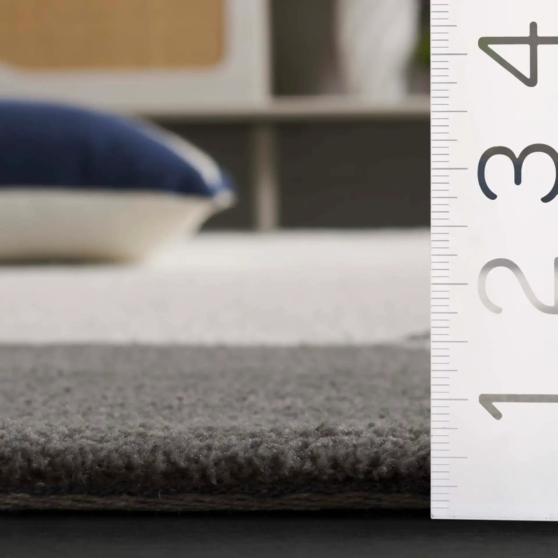 Audrey Abstract Block Rug in Gray / Ivory in a styled room