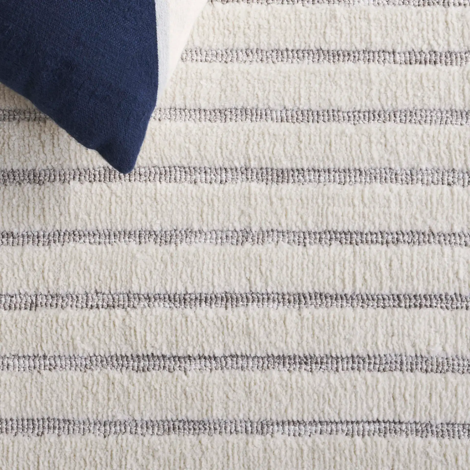 Audrey Abstract Block Rug in Gray / Ivory in a styled room