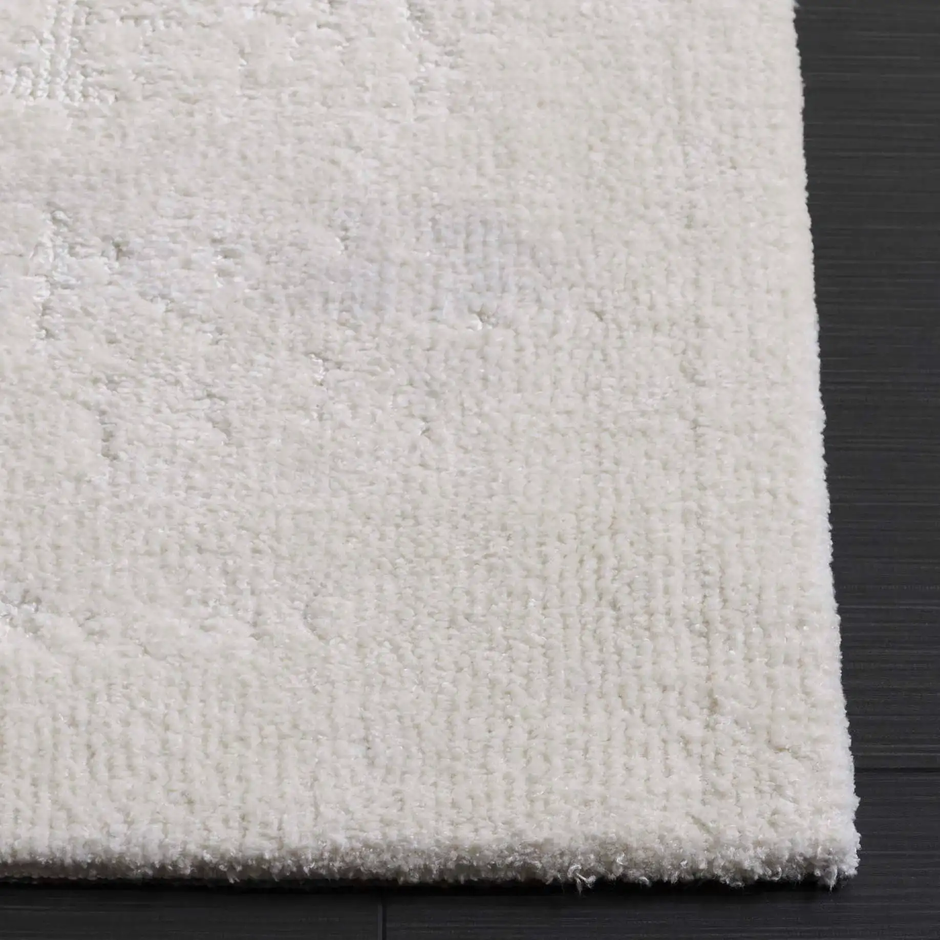 Audrey Textured Grid Rug in Ivory in a styled room