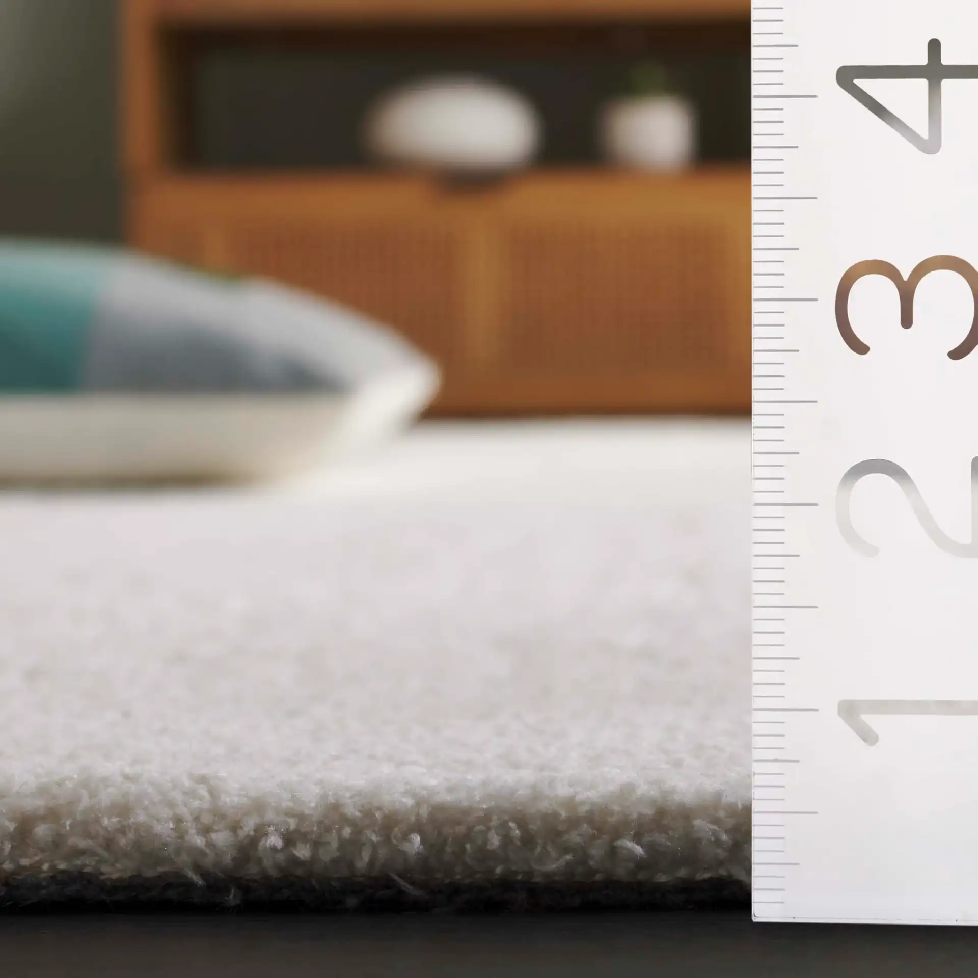 Audrey Textured Grid Rug in Ivory in a styled room