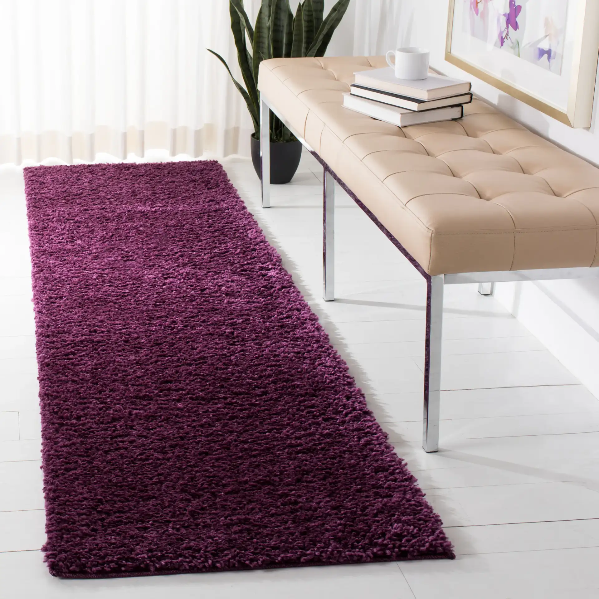 August Solid Shag Rug in Purple in a styled room