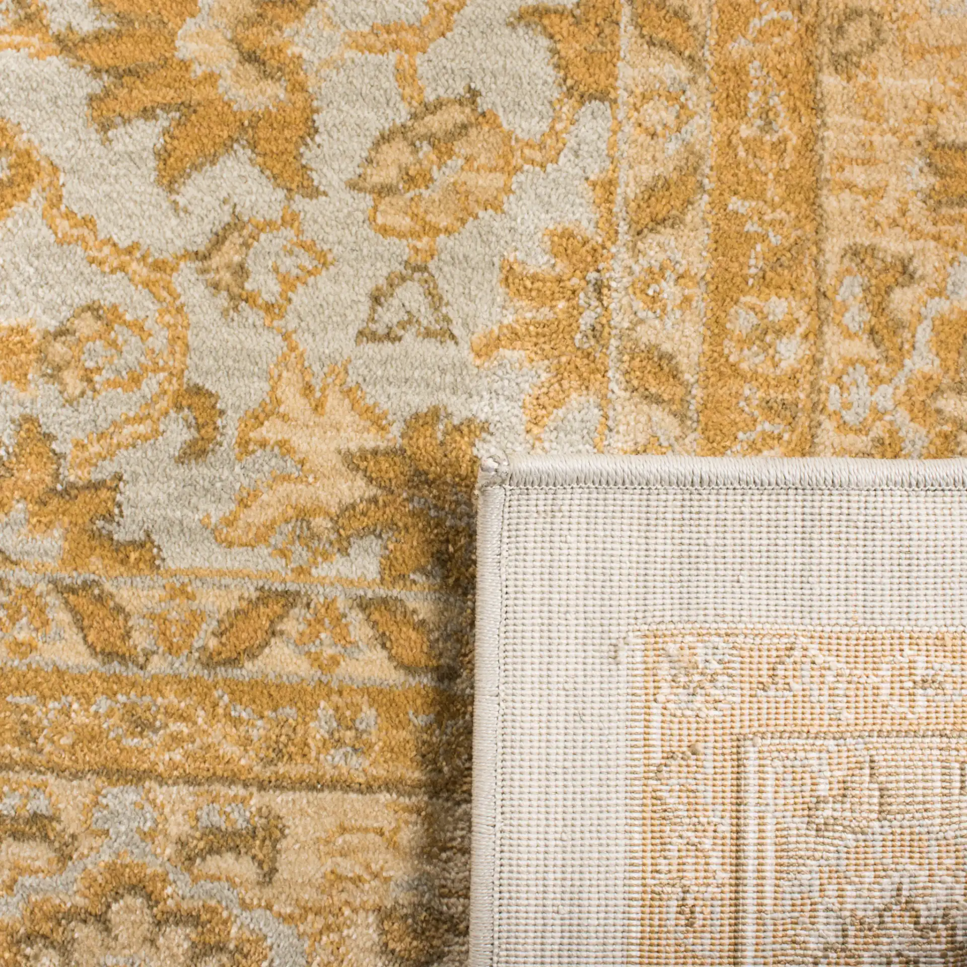 Austin Marcus Rug in Light Blue / Gold in a styled room