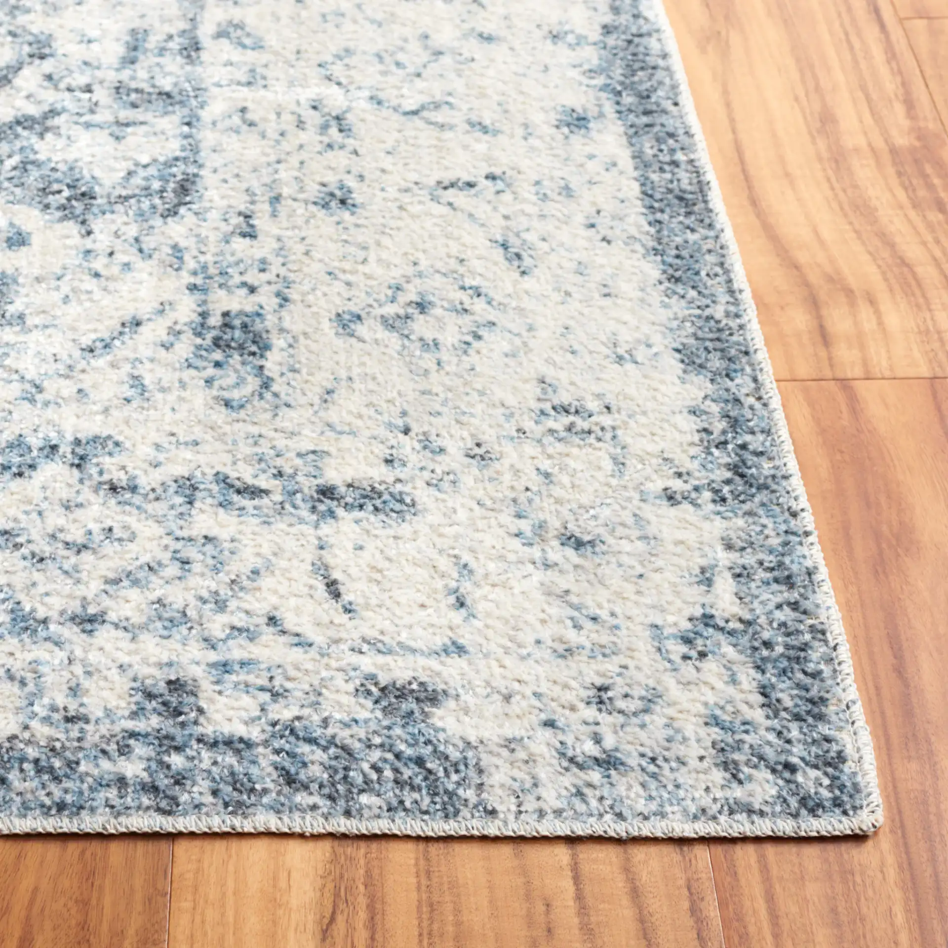 Baltimore Vintage Floral Medallion Washable Rug in Light Gray / Blue in a styled room