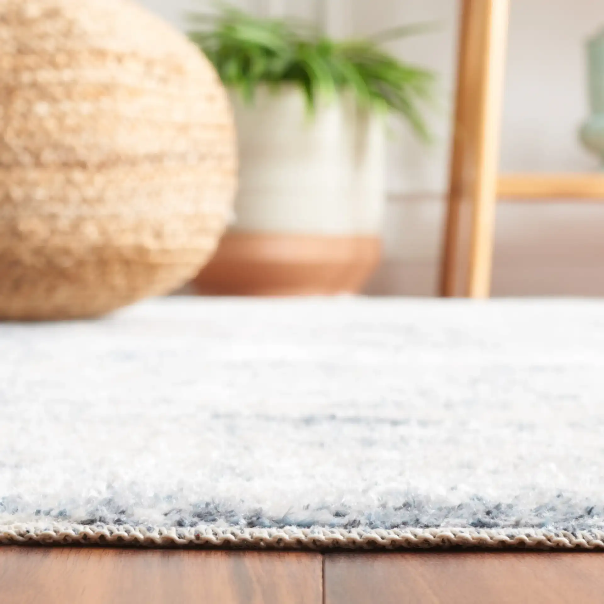 Baltimore Vintage Floral Medallion Washable Rug in Light Gray / Blue in a styled room