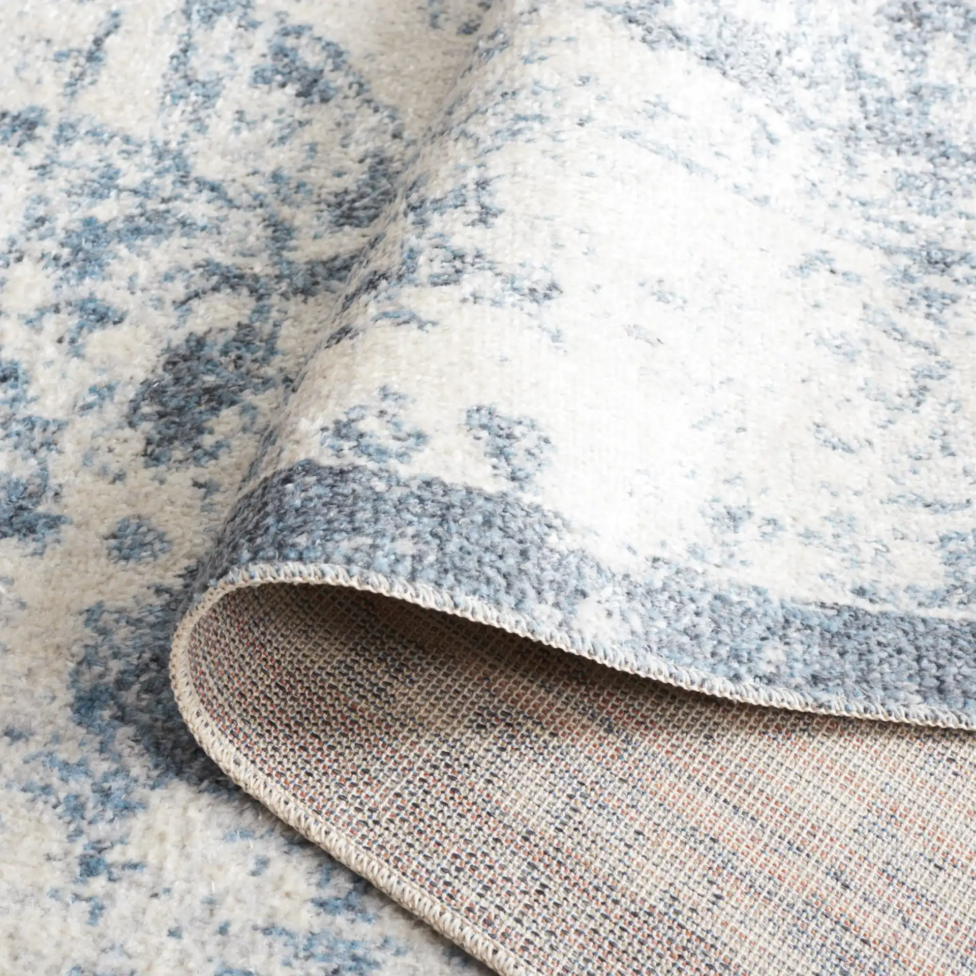 Baltimore Vintage Floral Medallion Washable Rug in Light Gray / Blue in a styled room