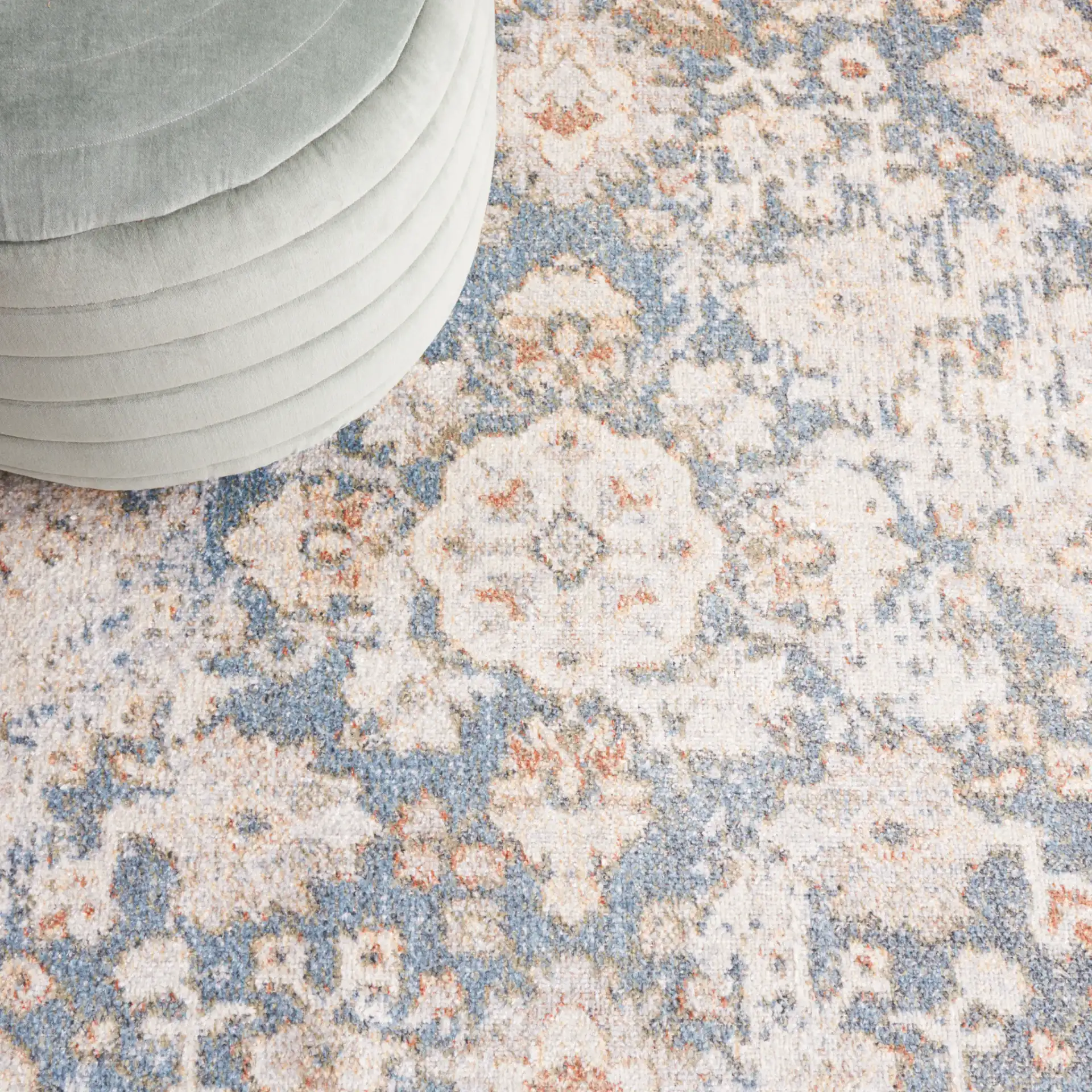 Baltimore Faded Medallion Washable Rug in Light Gray / Blue in a styled room