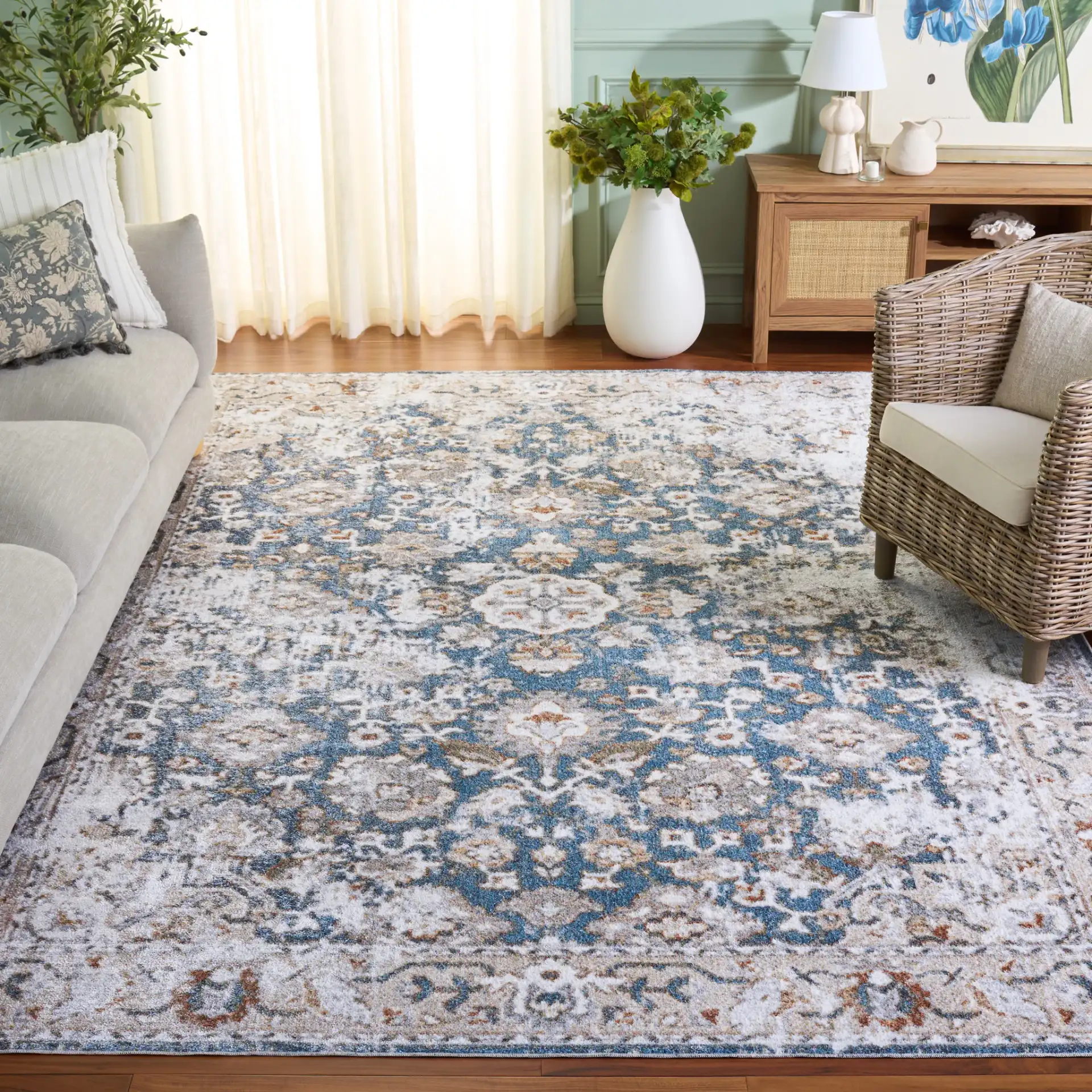 Baltimore Faded Medallion Washable Rug in Light Gray / Blue in a styled room
