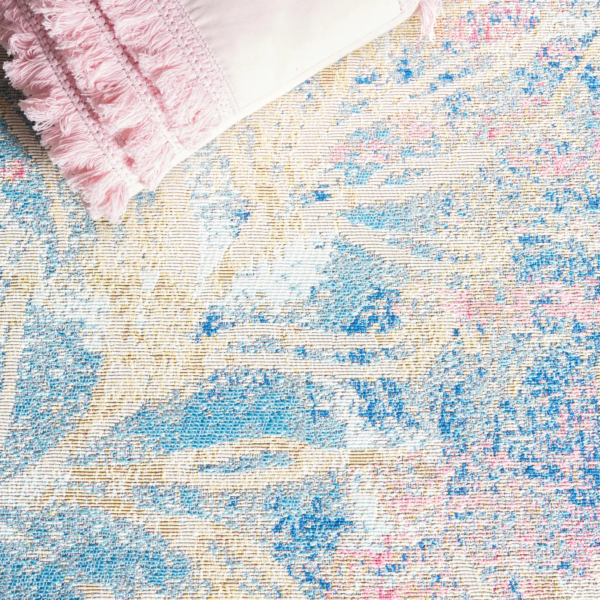 Barbados Distressed Palm Outdoor Rug in Light Blue / Ivory in a styled room