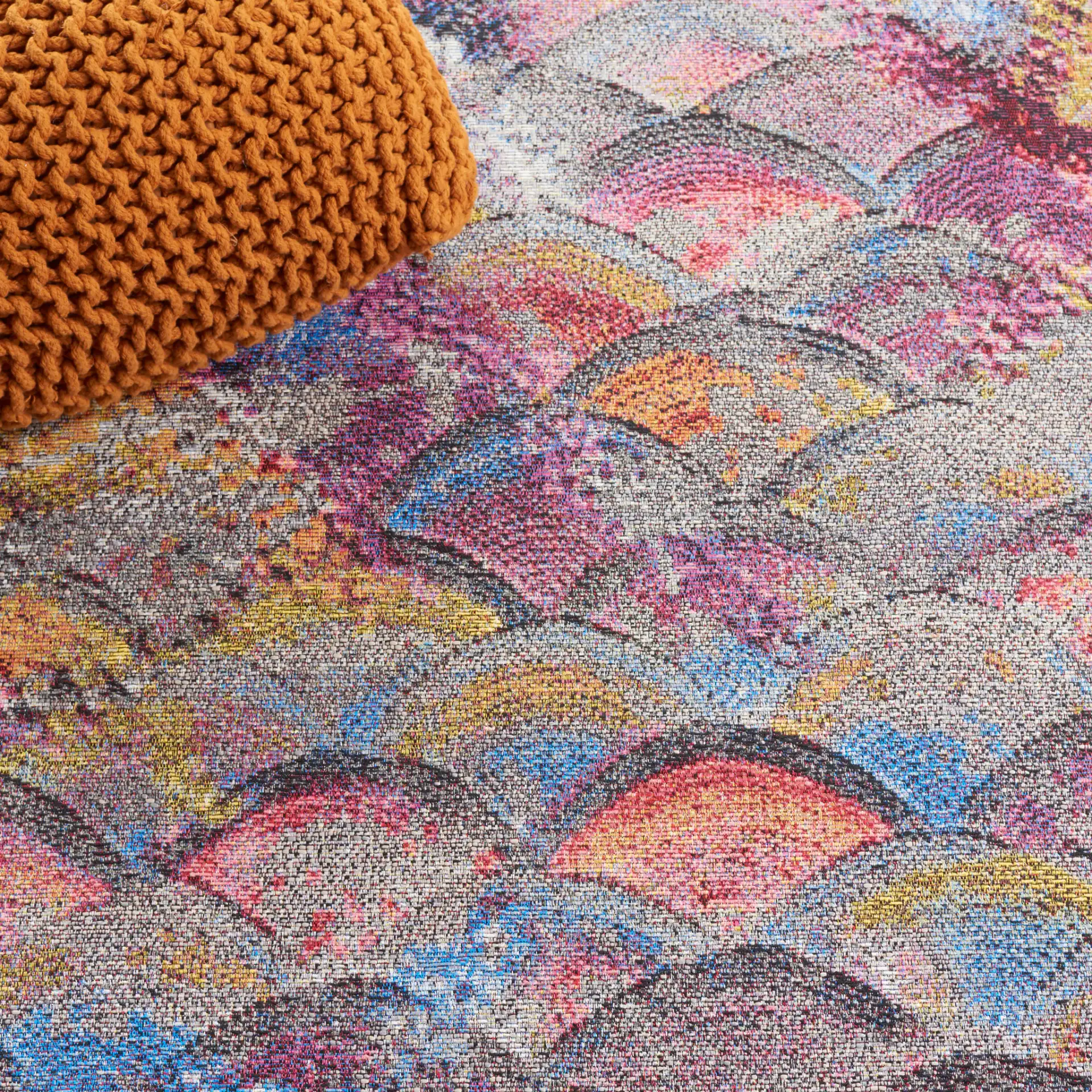 Barbados Scalloped Fan Outdoor Rug in Gray Purple / Blue Gold in a styled room