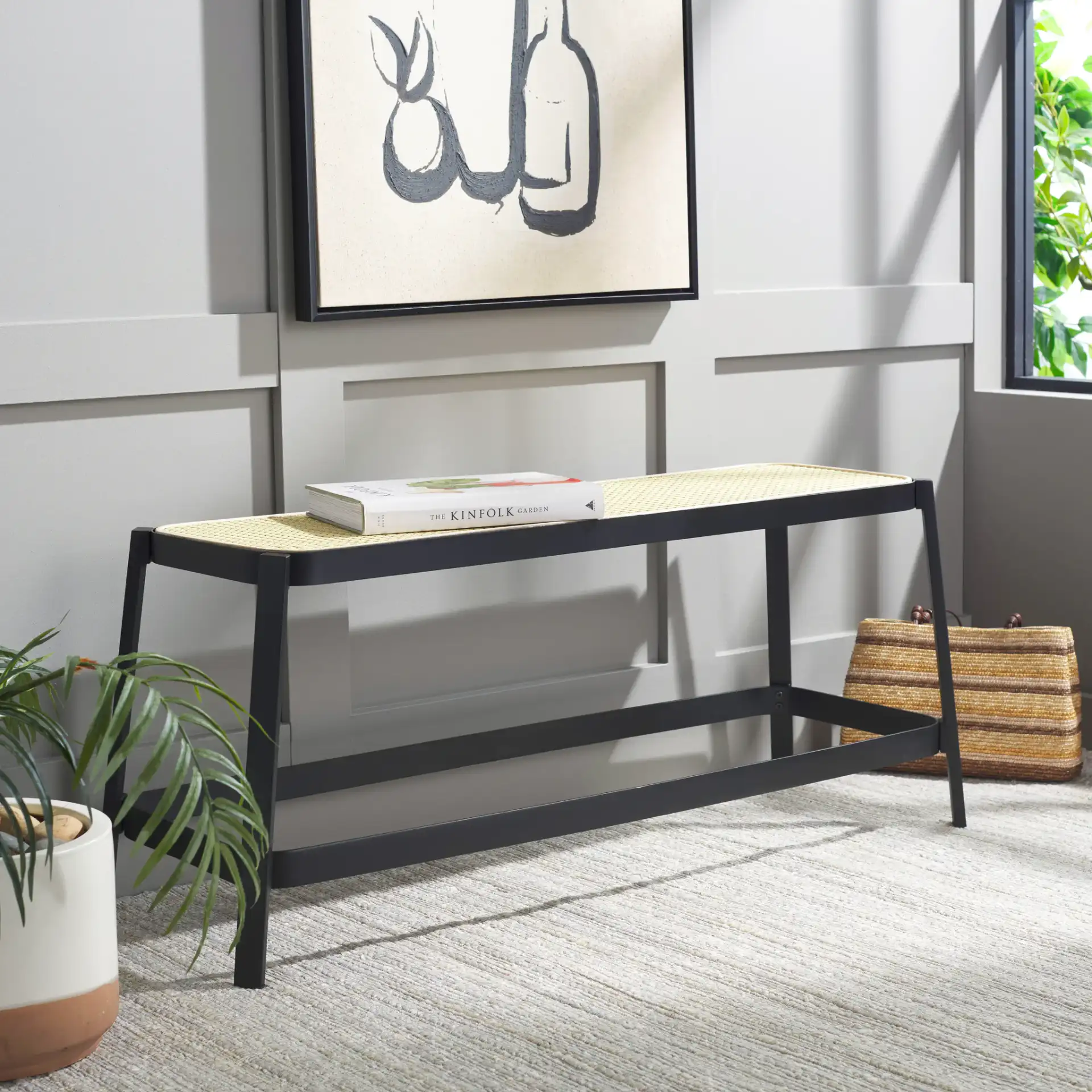 Jaguar Cane Bench in Black / Natural in a styled room