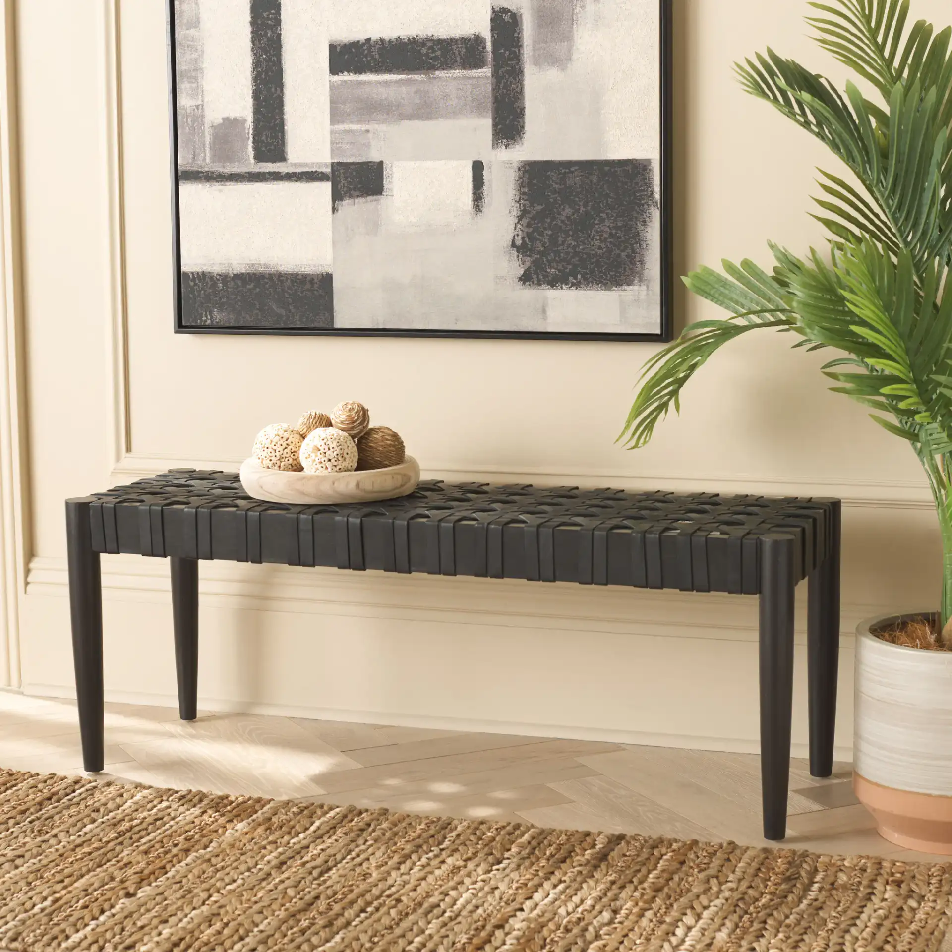 Walda Leather Woven Bench in Black in a styled room