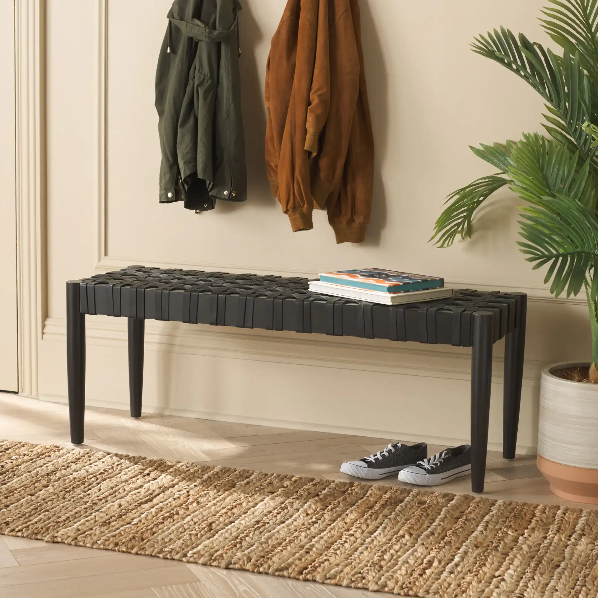 Walda Leather Woven Bench in Black in a styled room