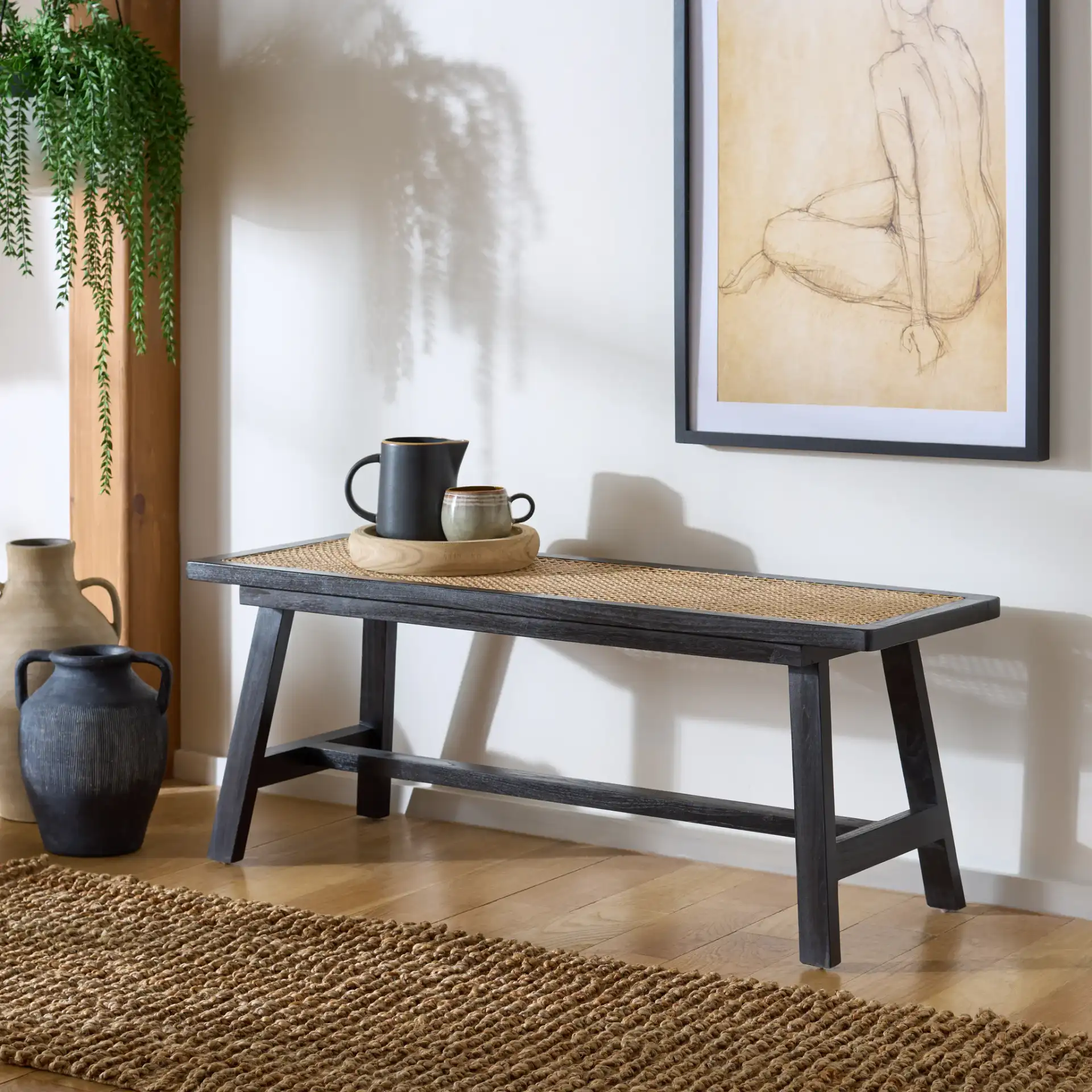 Henrik Cane Bench in Black / Natural in a styled room