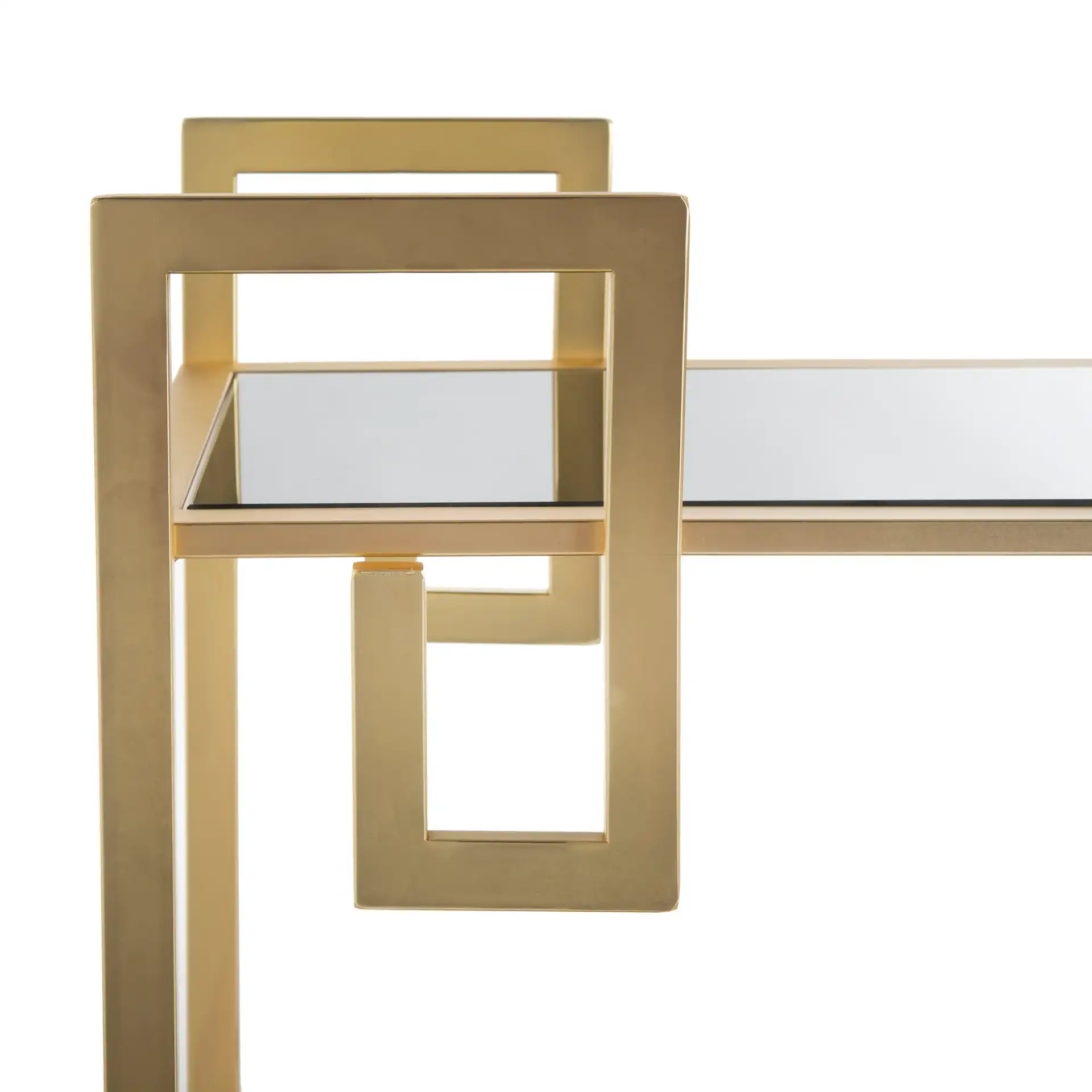 Eliza Two-Tier Bar Cart in Matte Brass / Clear in a styled room