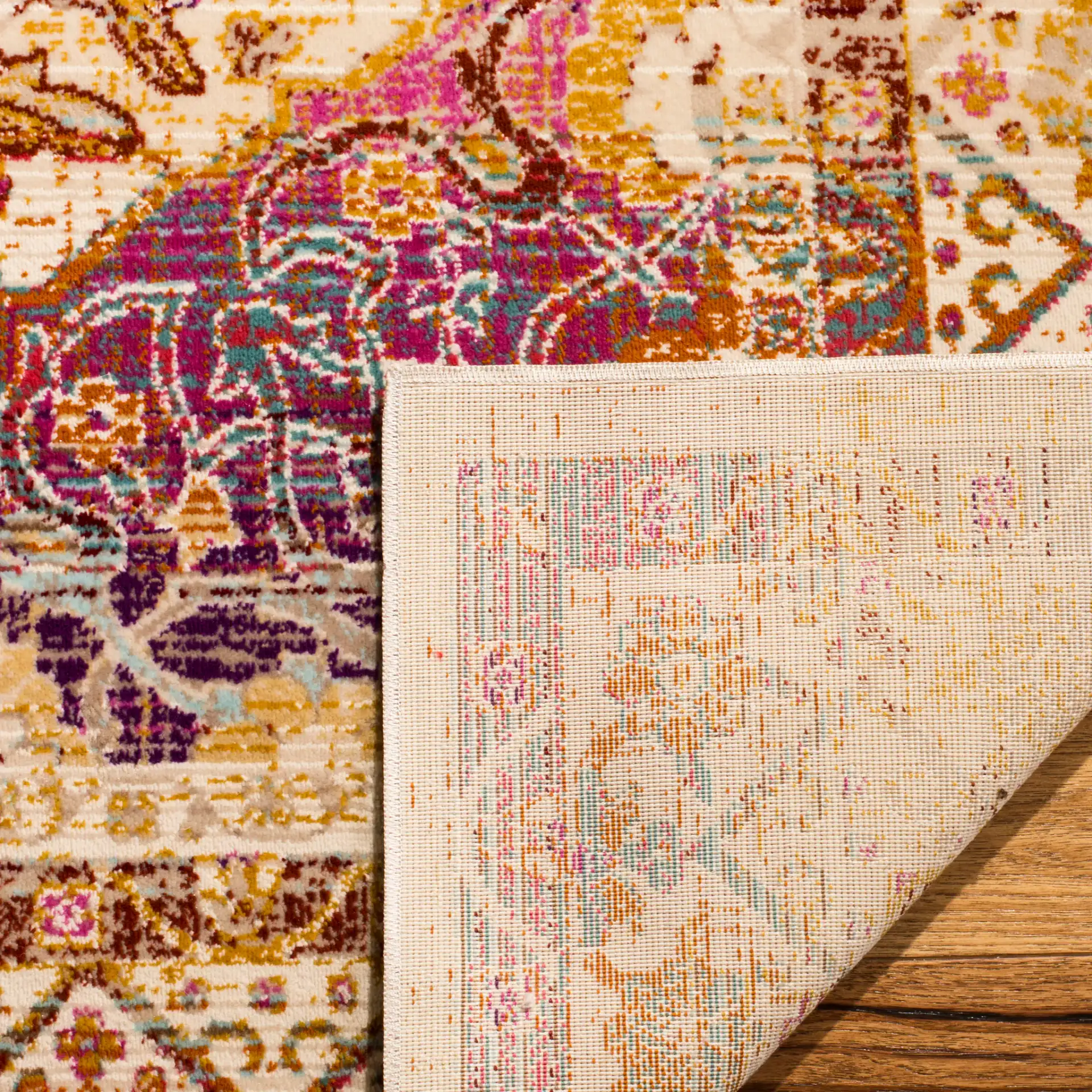 Baldwin Medallion Bordered Rug in Ivory / Fuchsia in a styled room