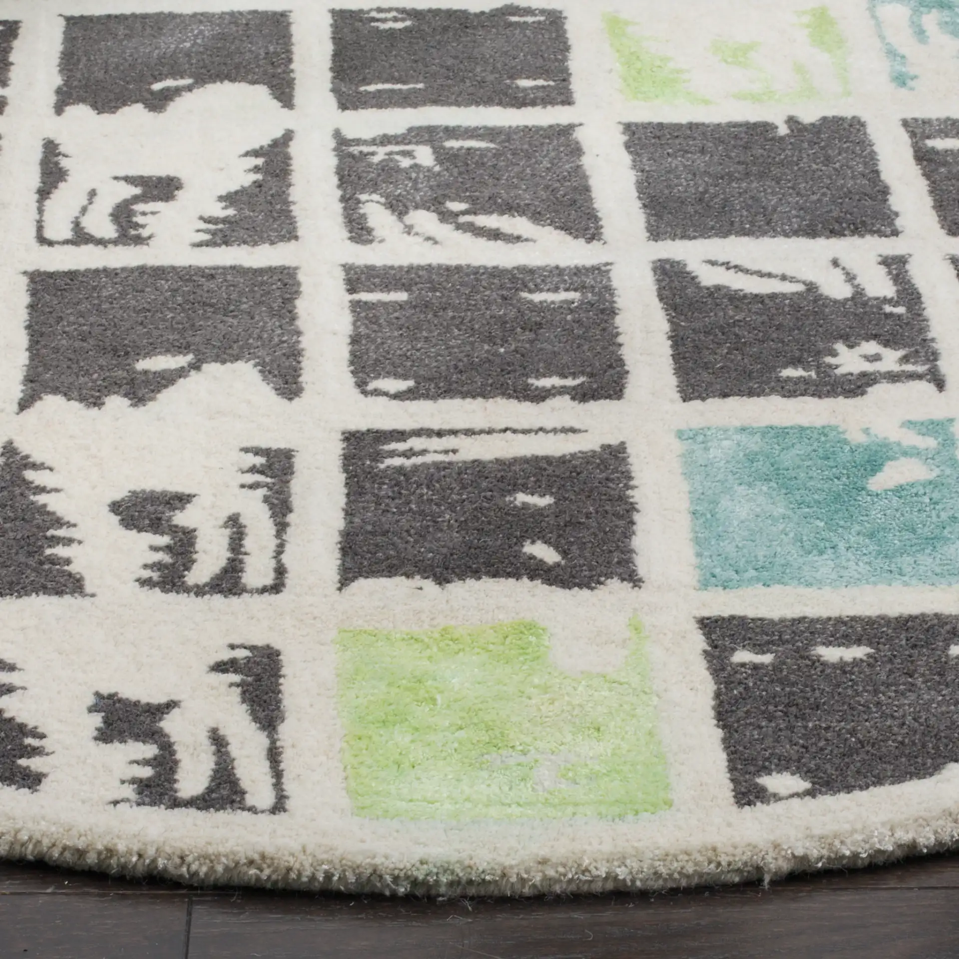 Bella Checkered Grid Hand-Tufted Wool Rug in Gray / Ivory in a styled room
