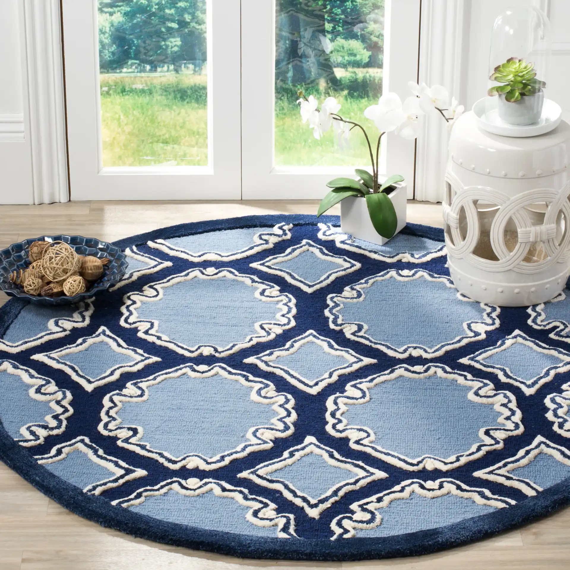 Bella Scalloped Trellis Hand-Tufted Wool Rug in Navy / Blue in a styled room