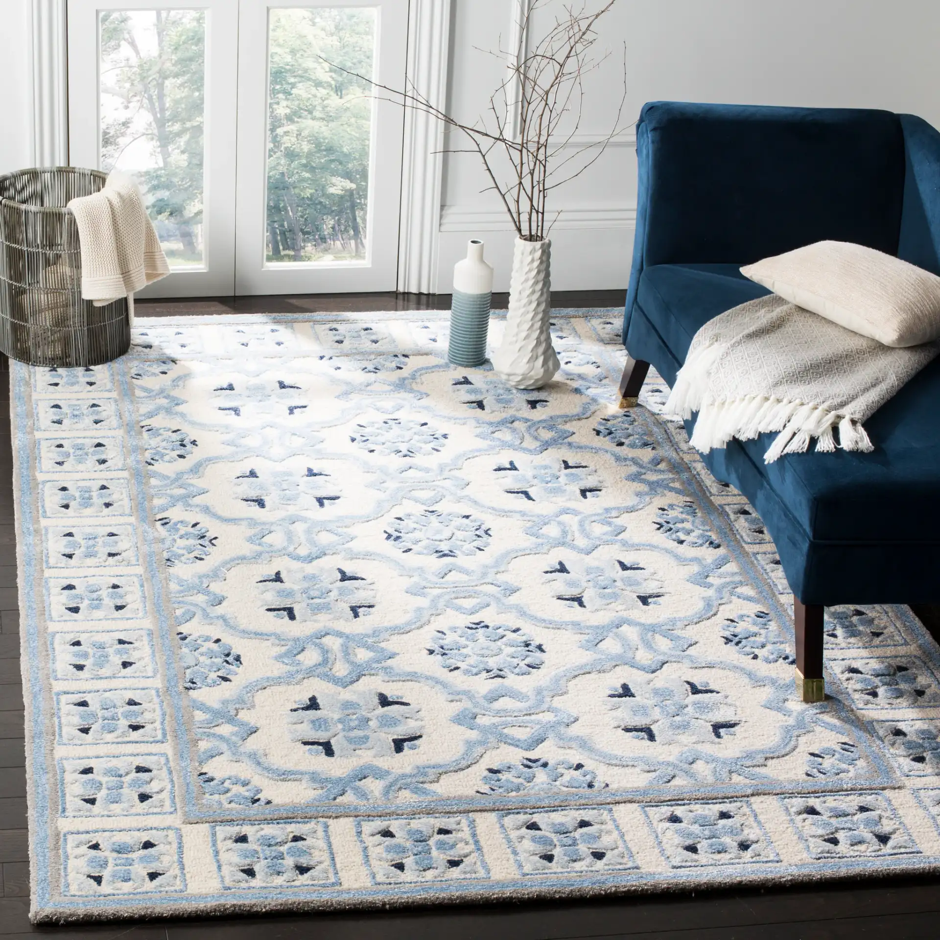 Bella Interlocking Trellis Hand-Tufted Rug in Ivory / Blue in a styled room