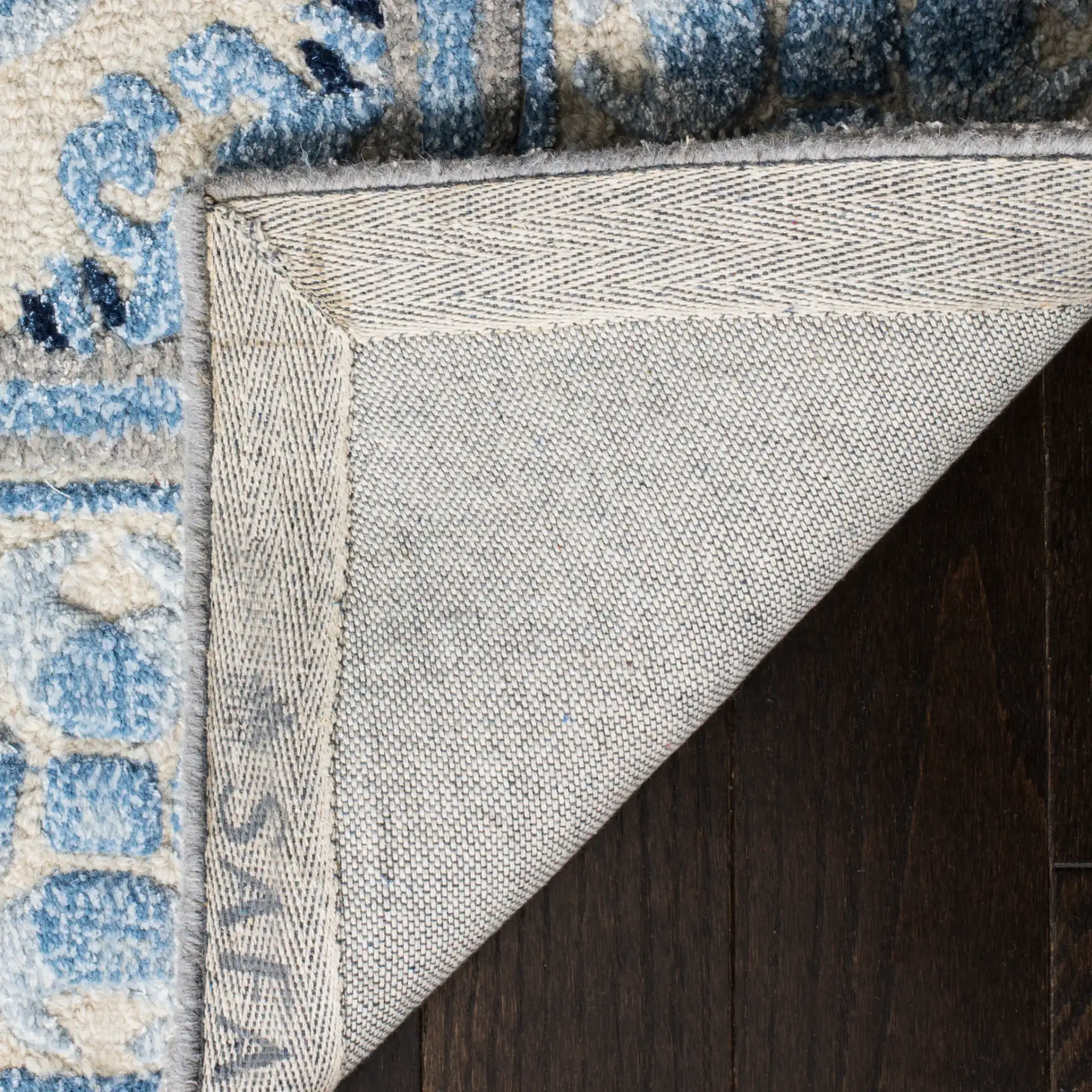 Bella Interlocking Trellis Hand-Tufted Rug in Ivory / Blue in a styled room