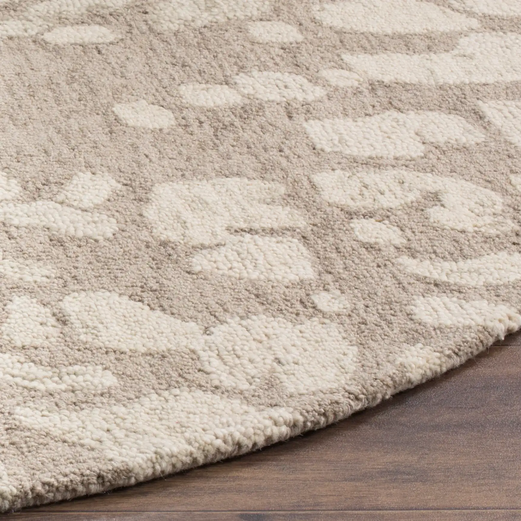 Bella Abstract Sunburst Hand-Tufted Wool Rug in Winter Taupe in a styled room