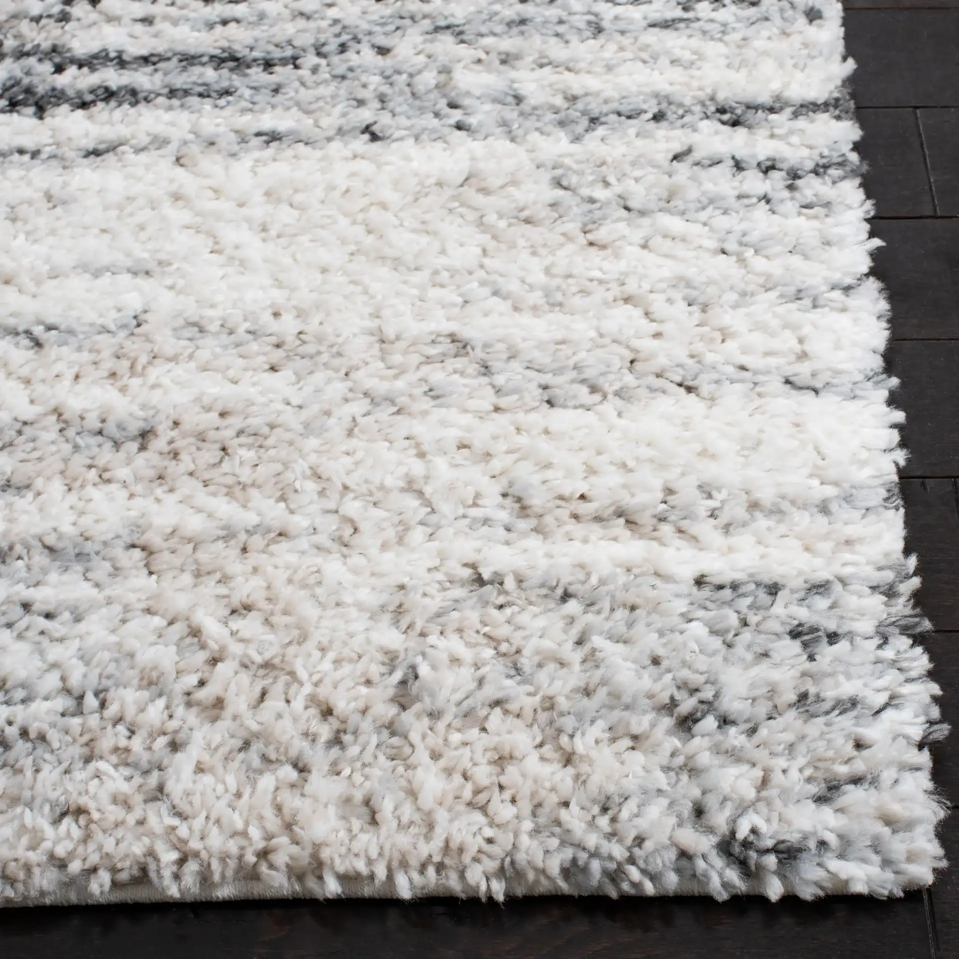Berber Linear Stripe Shag Rug in Gray / Ivory in a styled room