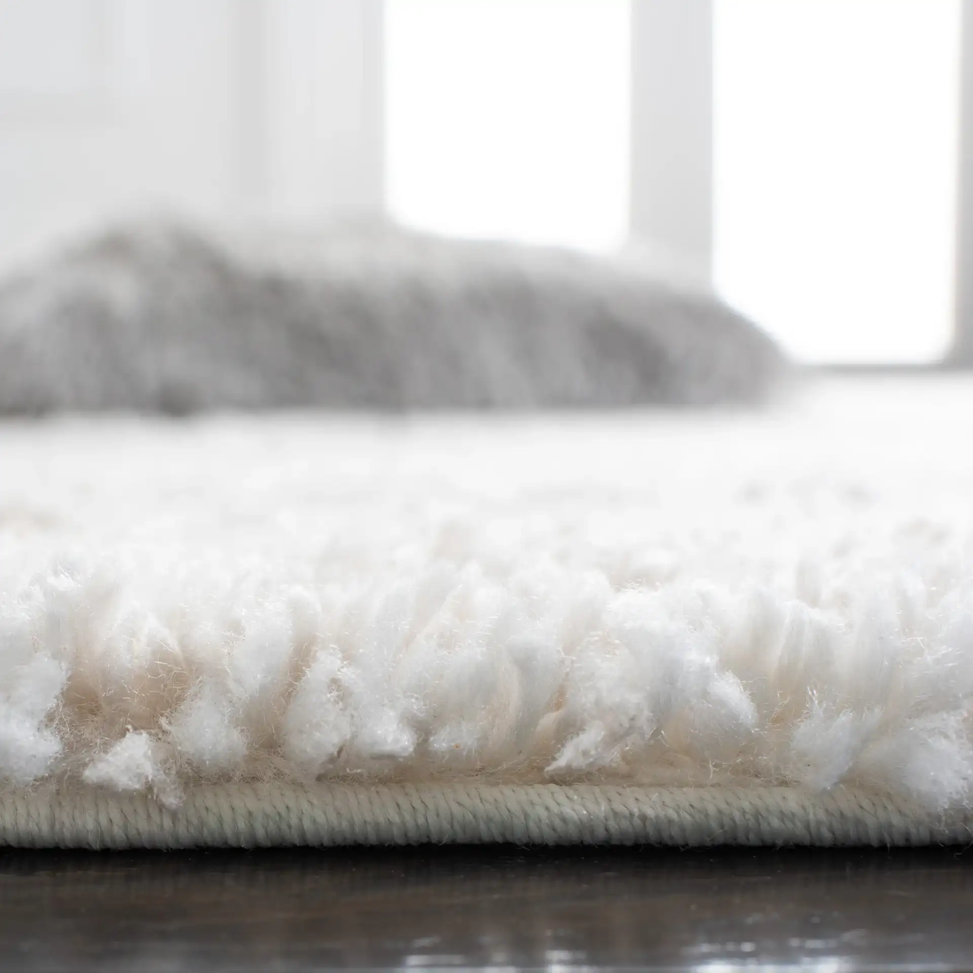 Berber Linear Stripe Shag Rug in Gray / Ivory in a styled room