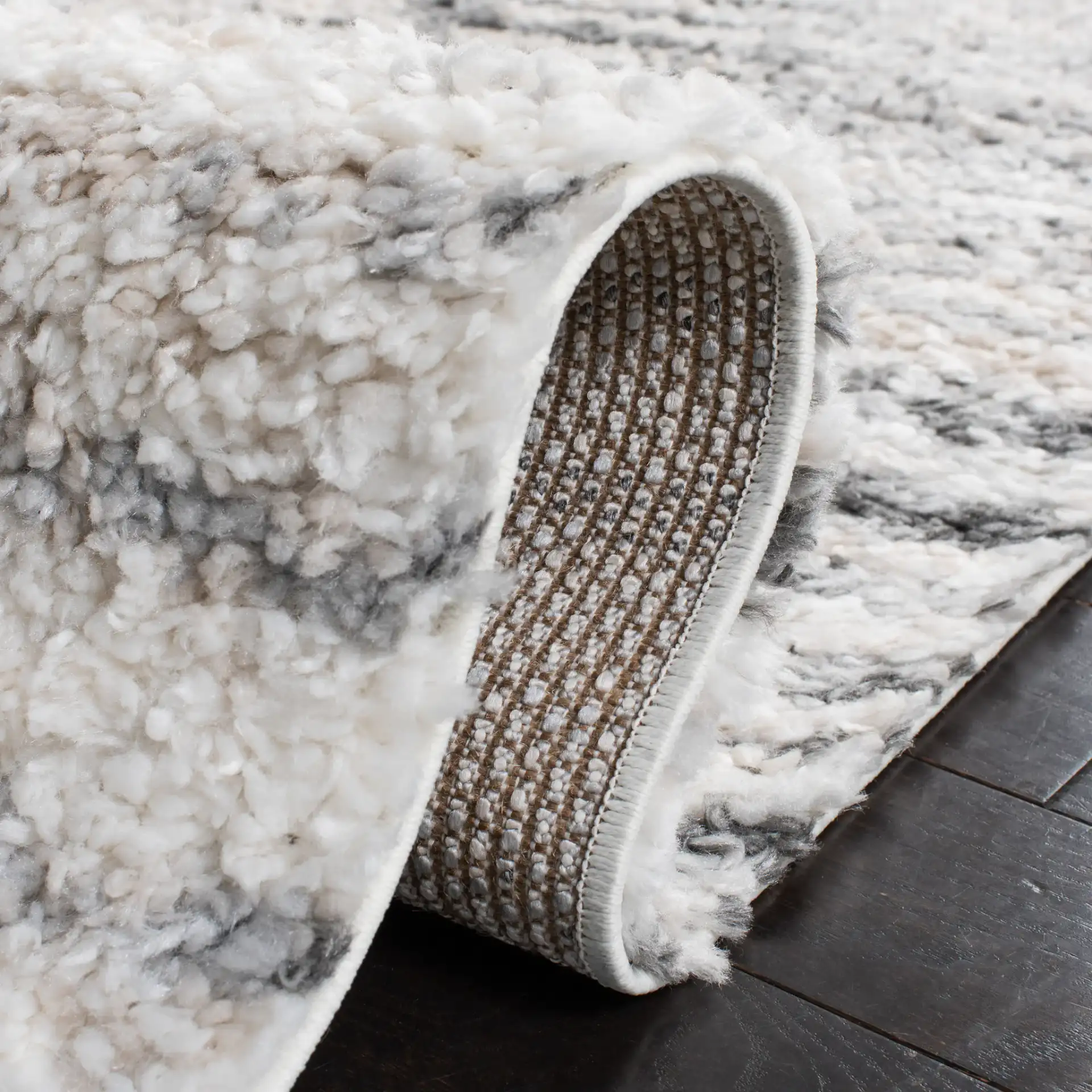 Berber Linear Stripe Shag Rug in Gray / Ivory in a styled room