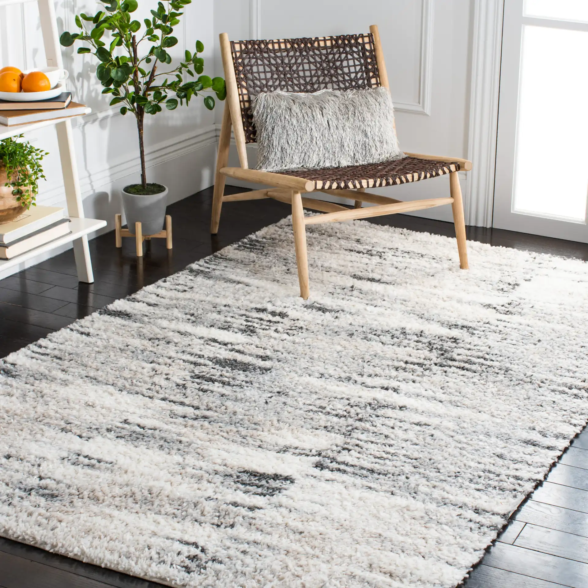 Berber Linear Stripe Shag Rug in Gray / Ivory in a styled room