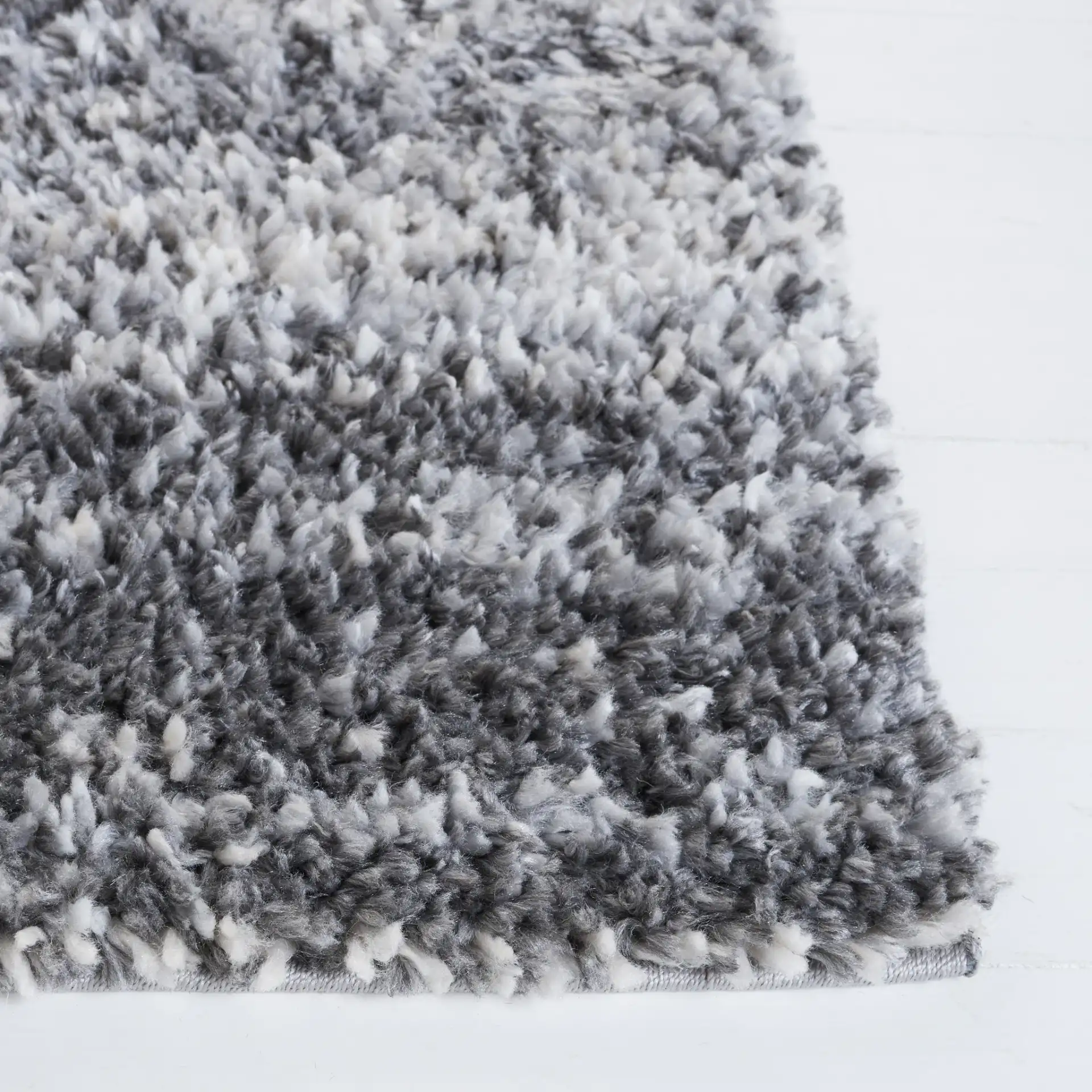 Berber Gradient Shag Rug in Gray / Charcoal in a styled room