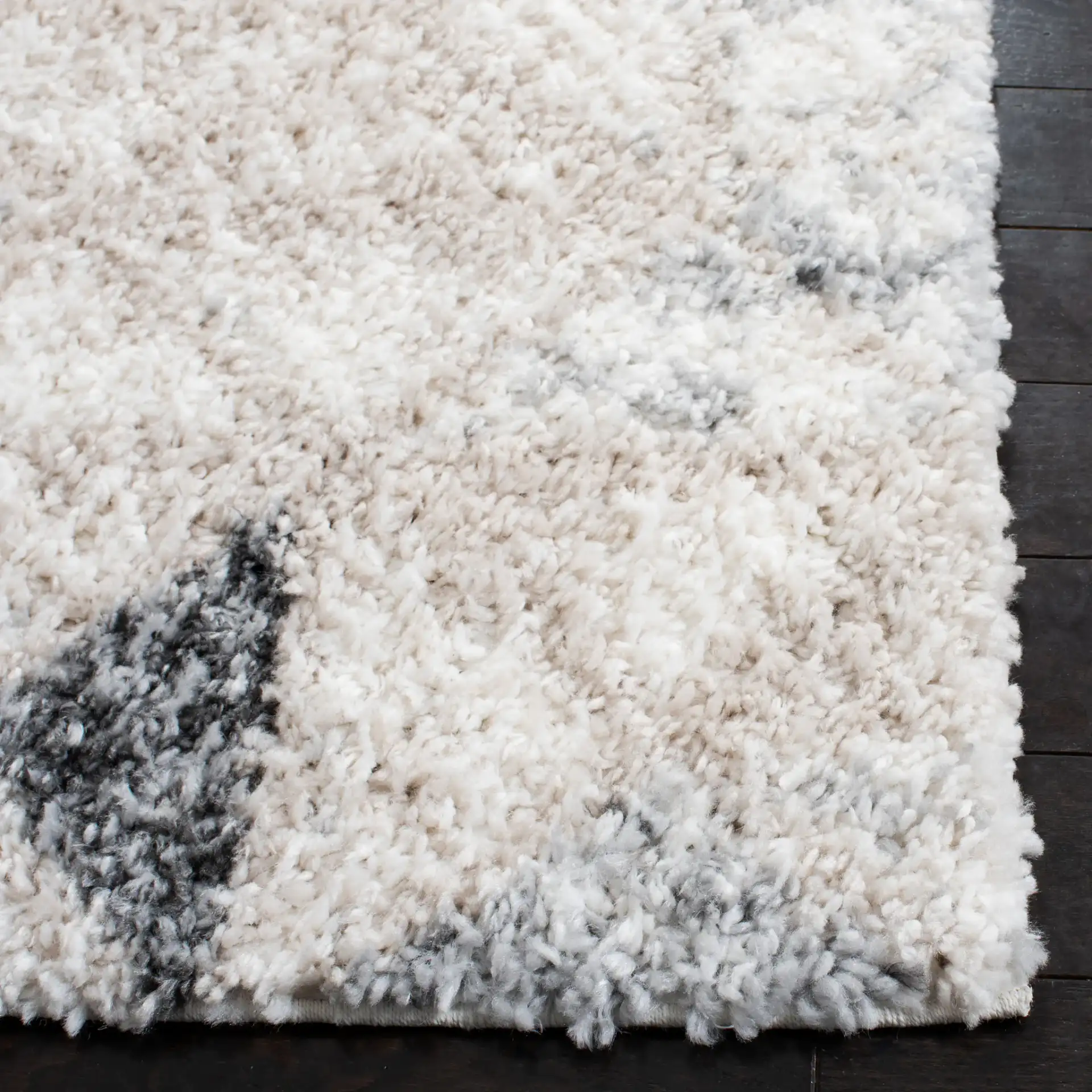 Berber Triangle Shag Rug in Gray / Ivory in a styled room