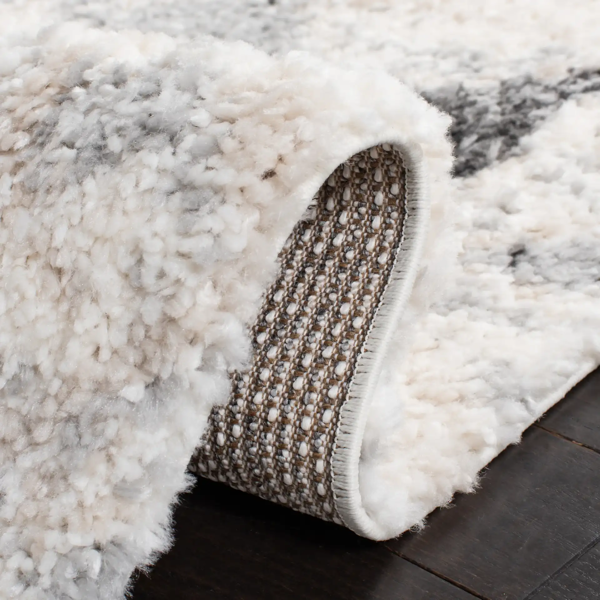 Berber Triangle Shag Rug in Gray / Ivory in a styled room