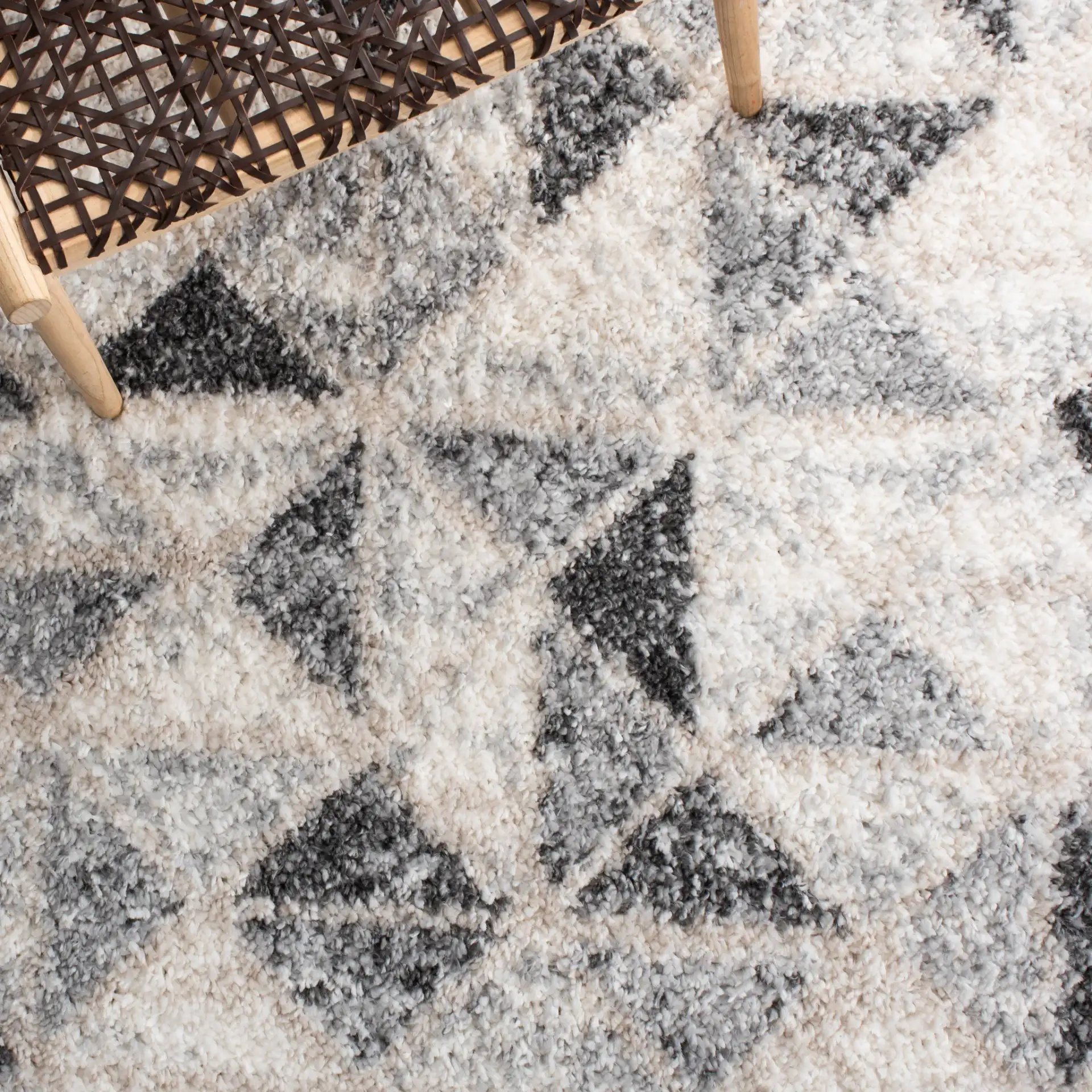 Berber Triangle Shag Rug in Gray / Ivory in a styled room