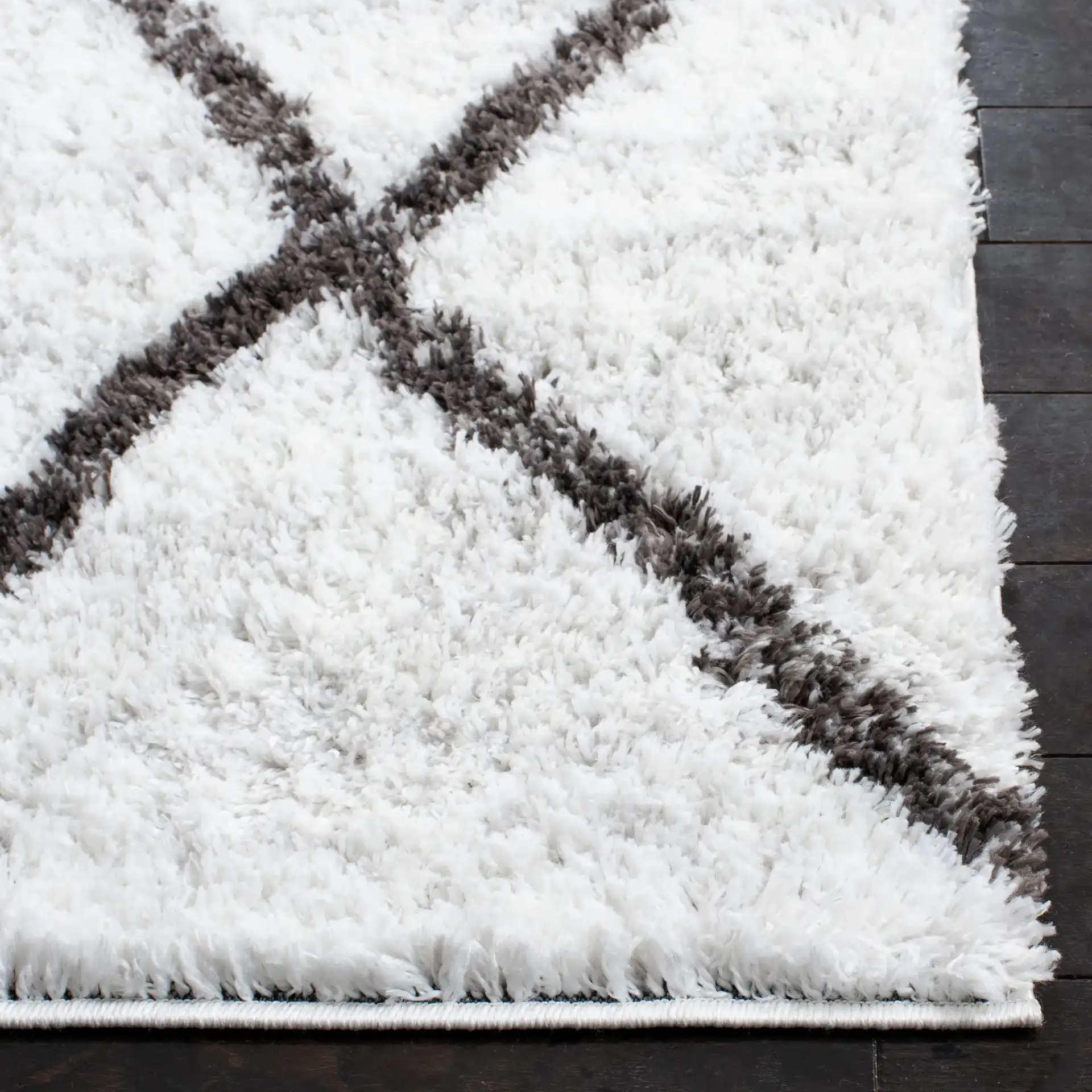 Berber Oversized Diamond Trellis Shag Rug in Ivory / Gray in a styled room