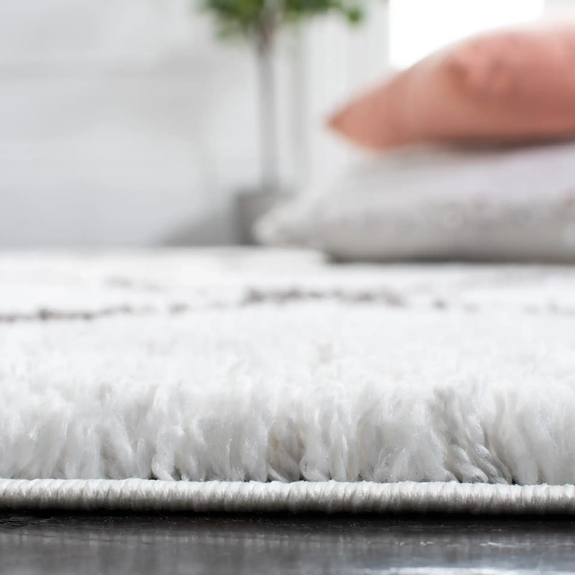 Berber Oversized Diamond Trellis Shag Rug in Ivory / Gray in a styled room