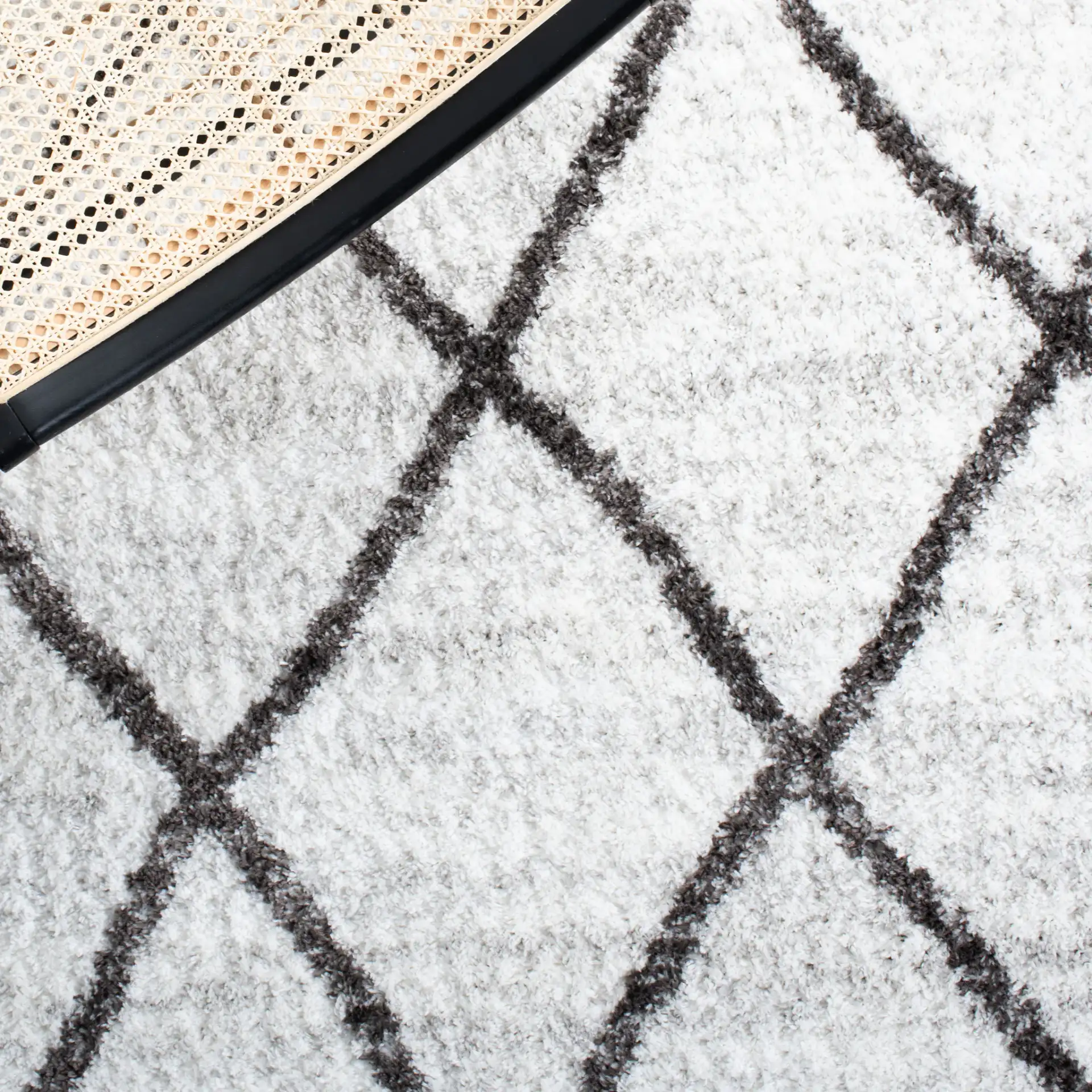 Berber Oversized Diamond Trellis Shag Rug in Ivory / Gray in a styled room